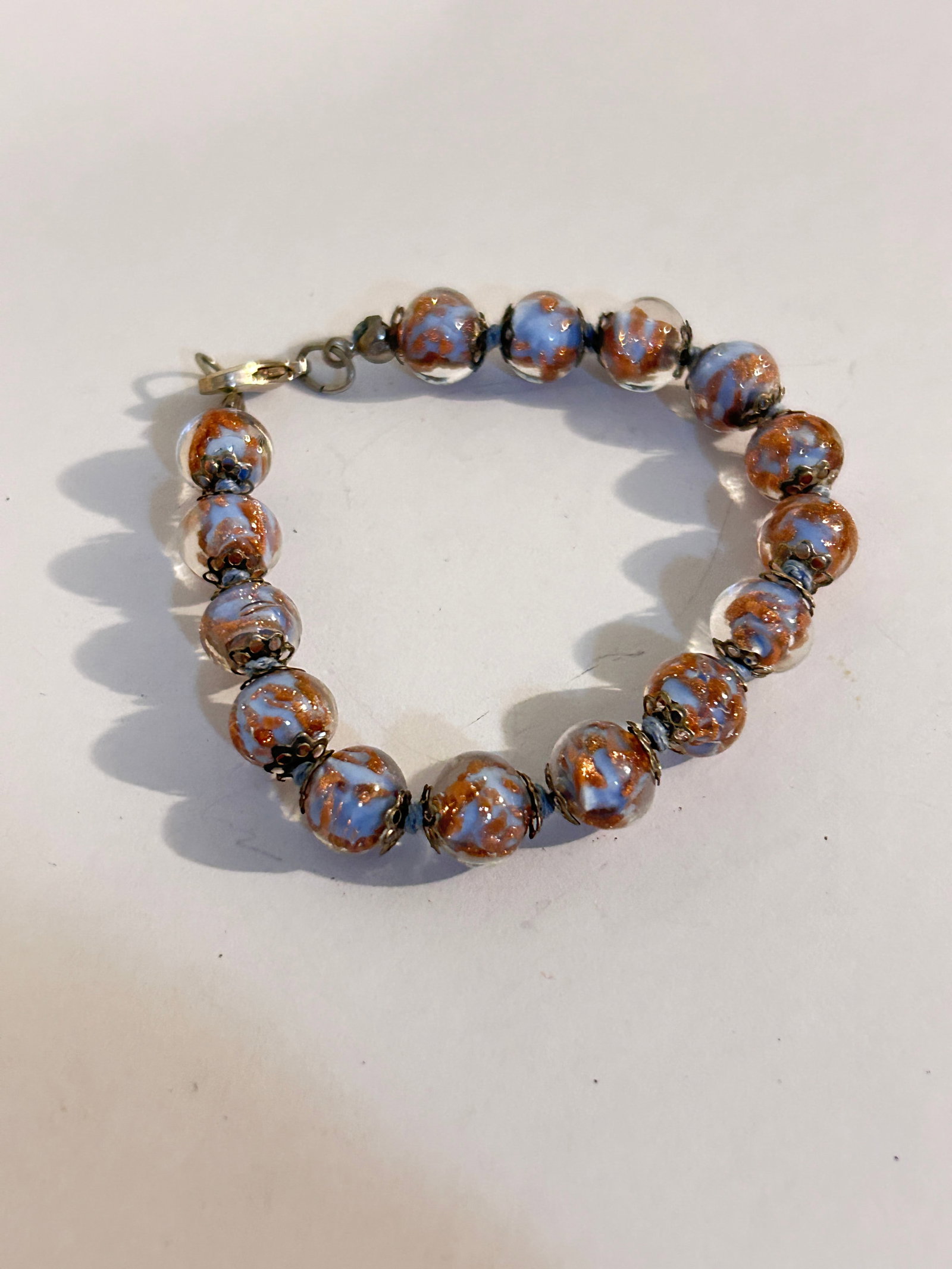 Vintage Murano Glass bead Bracelet 7": Vintage Murano Glass bead Bracelet 7" Please view all photos as they are part of the description and condition of this Item, Feel free to contact me with questions or picture requests! Used Item AS IS
