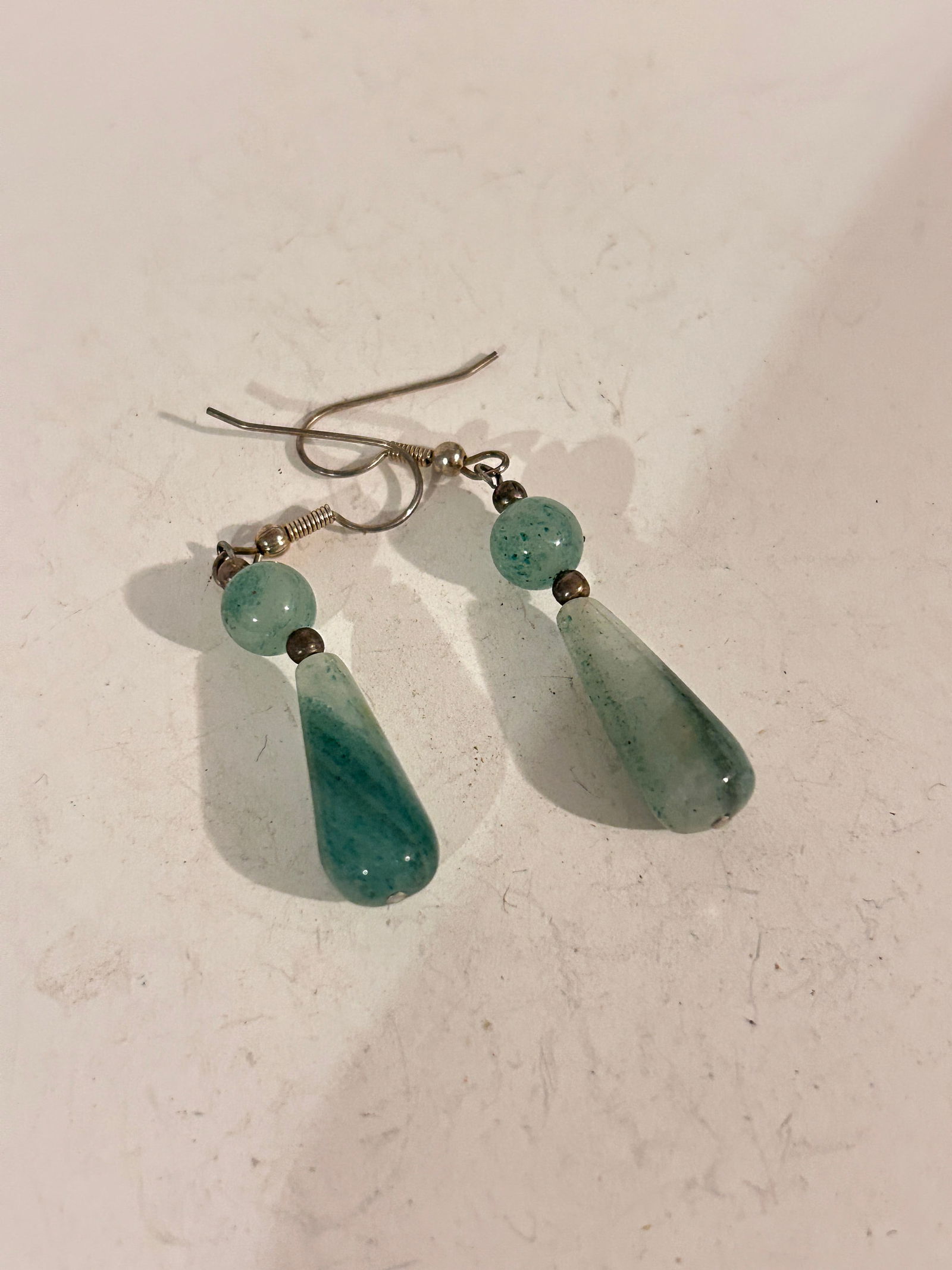 Vintage green Jadeite Earrings: Vintage green Jadeite Earrings Please view all photos as they are part of the description and condition of this Item, Feel free to contact me with questions or picture requests! Used Item AS IS