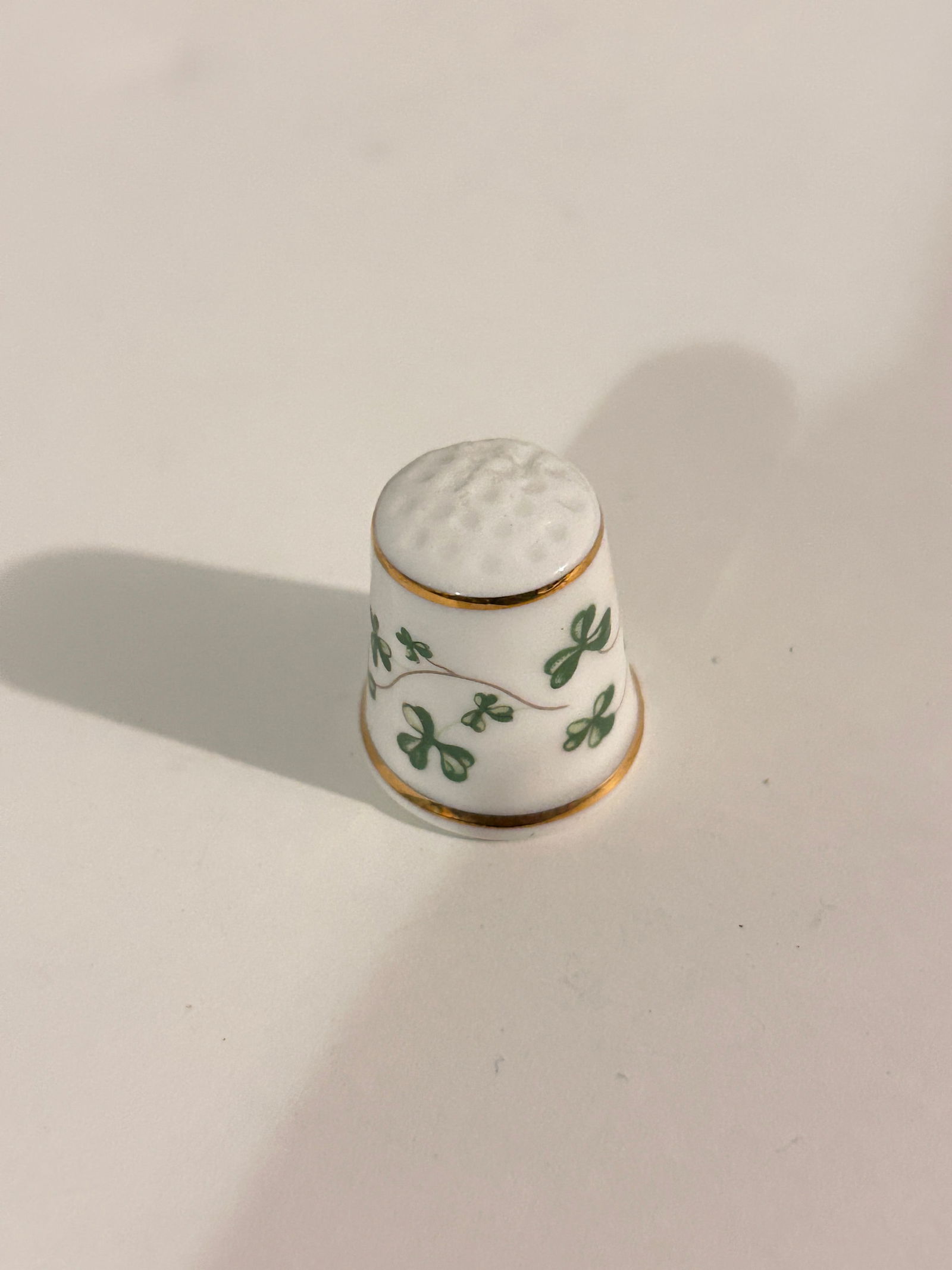 Irish Shamrocks - Porcelain Thimble - Royal Tara - Bone China Gold Trim: Irish Shamrocks - Porcelain Thimble - Royal Tara - Bone China Gold Trim Please view all photos as they are part of the description and condition of this Item, Feel free to contact me with questions or