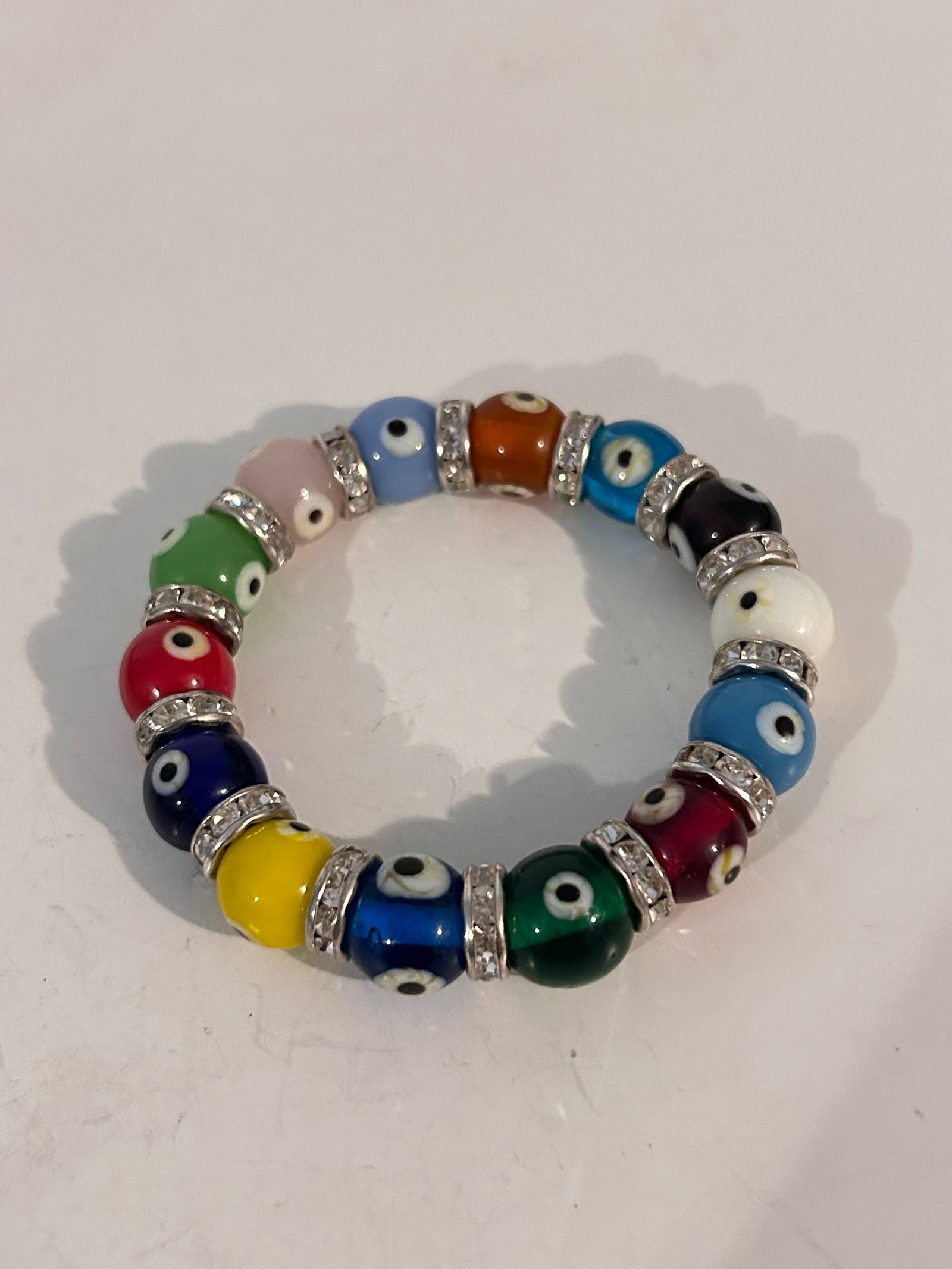 Vintage Evil Eye glass stretch Bracelet Sz 7": Vintage Evil Eye glass stretch Bracelet Sz 7" Please view all photos as they are part of the description and condition of this Item, Feel free to contact me with questions or picture requests! Used It