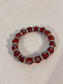 Vintage red glass evil eye stretch Bracelet Sz 8"