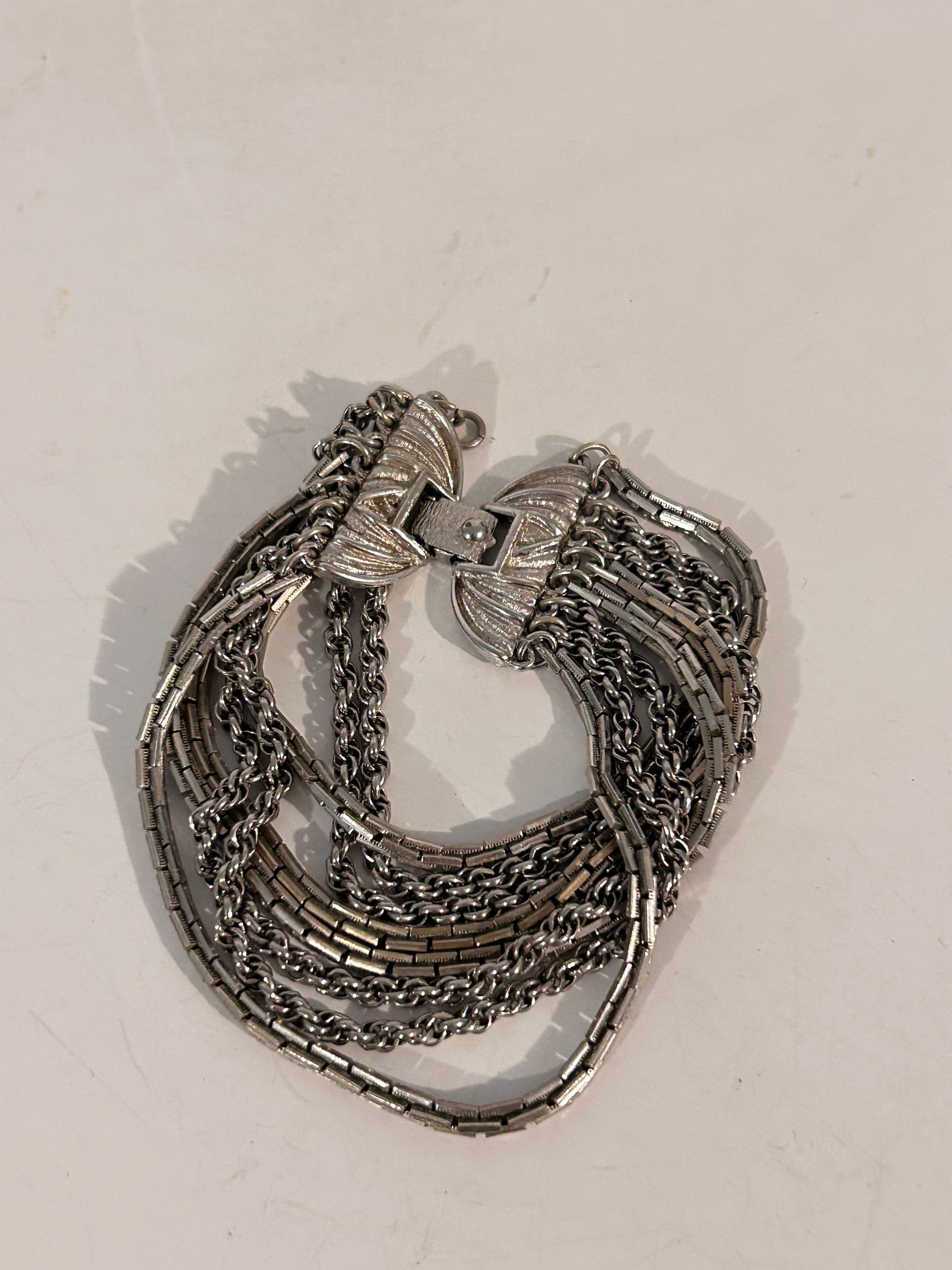 Vintage Monet 7 strand Bracelet Sz 7": Vintage Monet 7 strand Bracelet Sz 7" Please view all photos as they are part of the description and condition of this Item, Feel free to contact me with questions or picture requests! Used Item AS IS