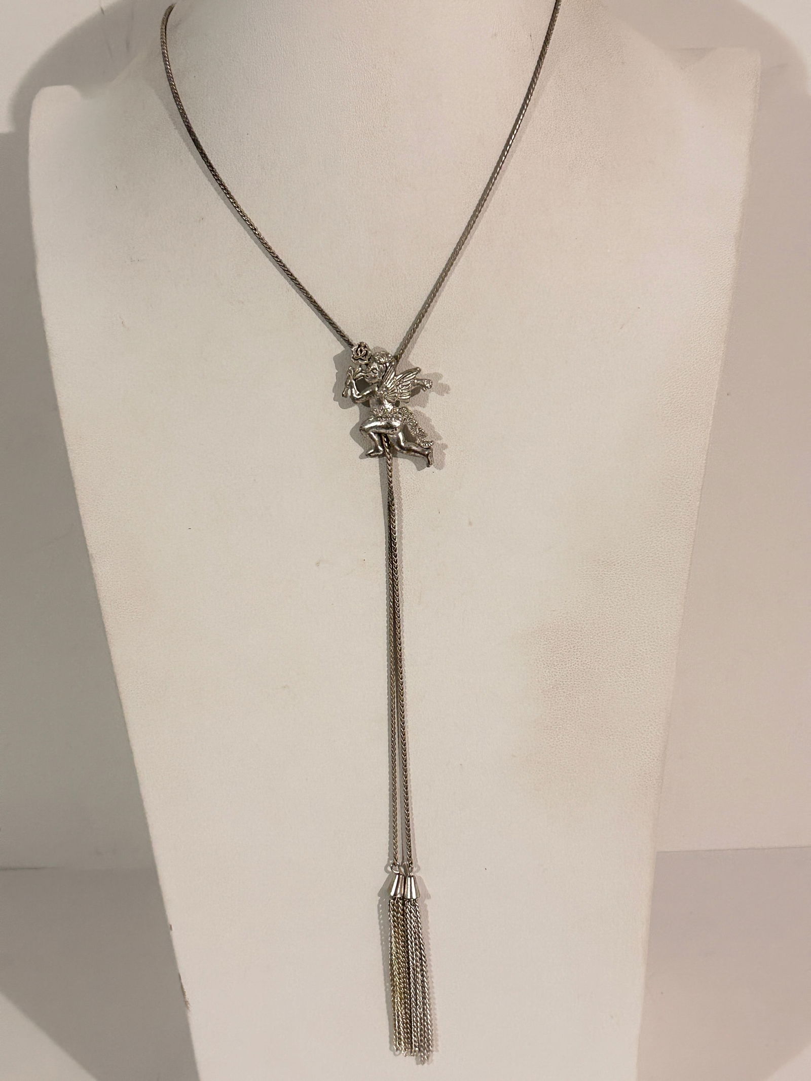 Vintage Silver Tone Angel pendant tassel Necklace Sz 34": Vintage Silver Tone Angel pendant tassel Necklace Sz 34" Please view all photos as they are part of the description and condition of this Item, Feel free to contact me with questions or picture reques