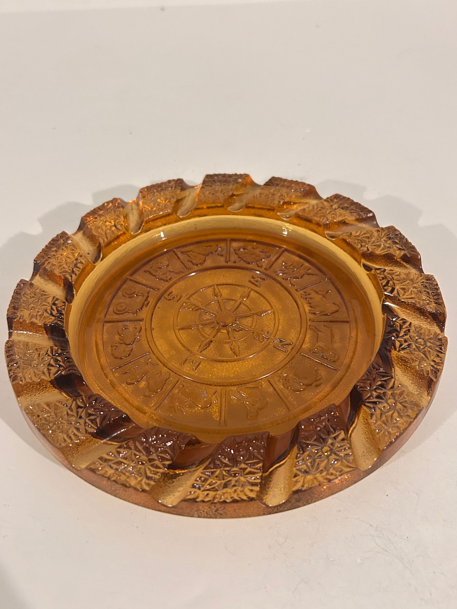Vintage IMPERIAL GLASS Depression Light Amber ZODIAC N S E W Round7.5 " Ashtray: Vintage IMPERIAL GLASS Depression Light Amber ZODIAC N S E W Round7.5 " Ashtray Please view all photos as they are part of the description and condition of this Item, Feel free to contact me with ques