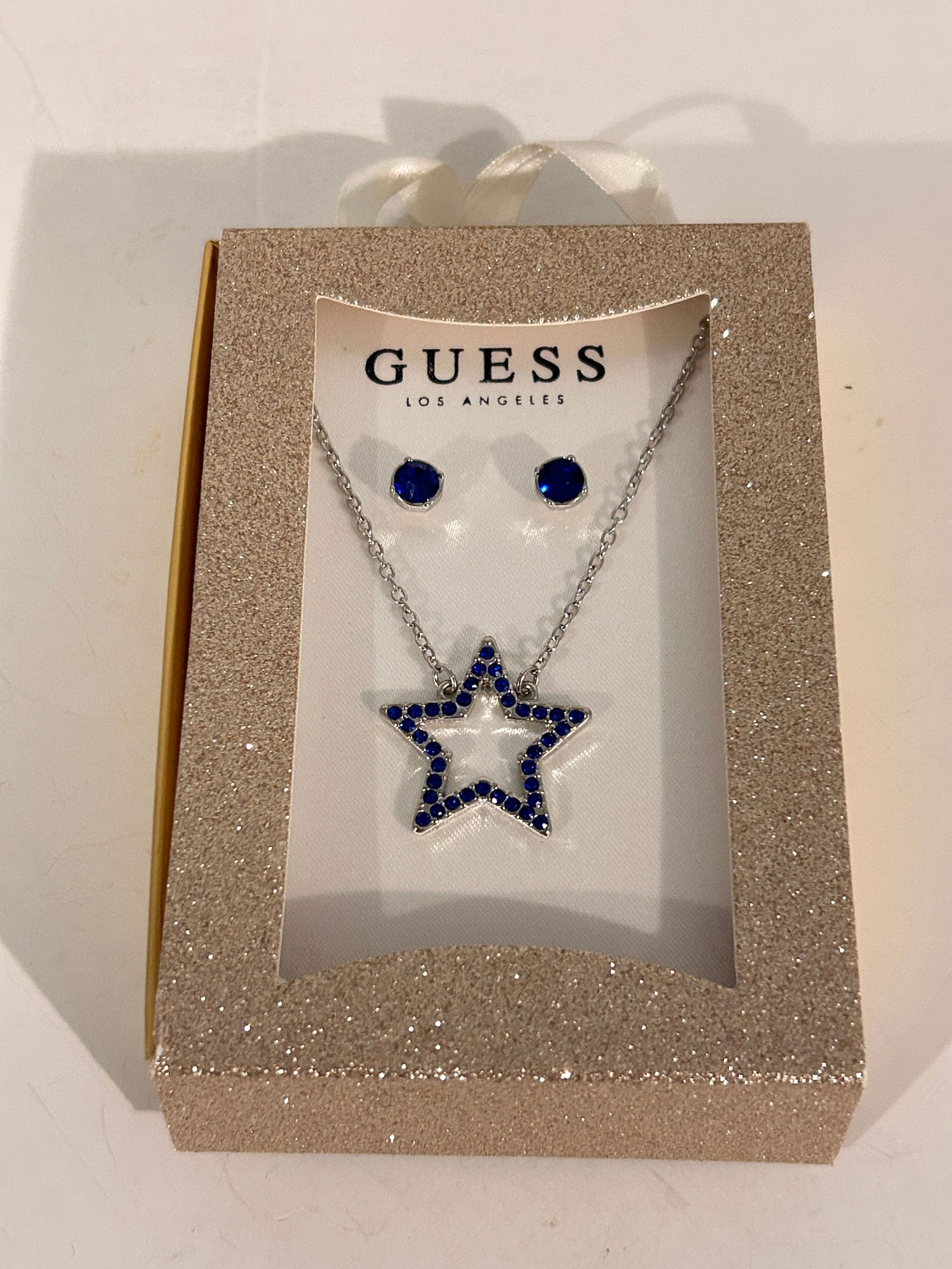 Vintage Guess Earrings & Necklace Set new in box: Vintage Guess Earrings & Necklace Set new in box Please view all photos as they are part of the description and condition of this Item, Feel free to contact me with questions or picture requests! Used