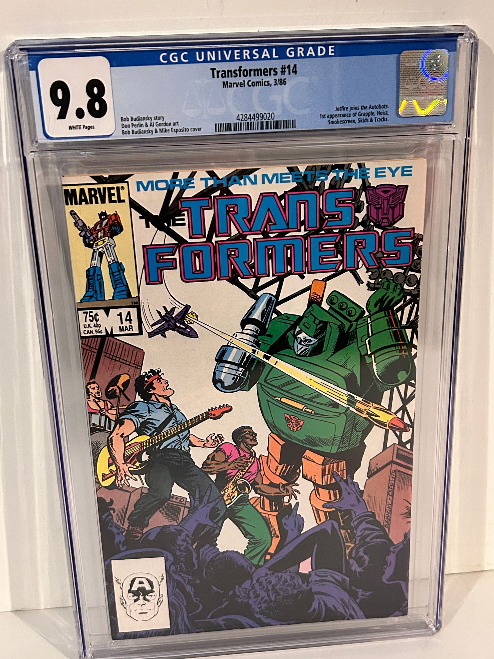 Vintage Comic Book Transformers #14 Key 1st app Grapple, Hoist, Smokescreen, Skids & Tracks CGC 9.8 (1 of 2)
