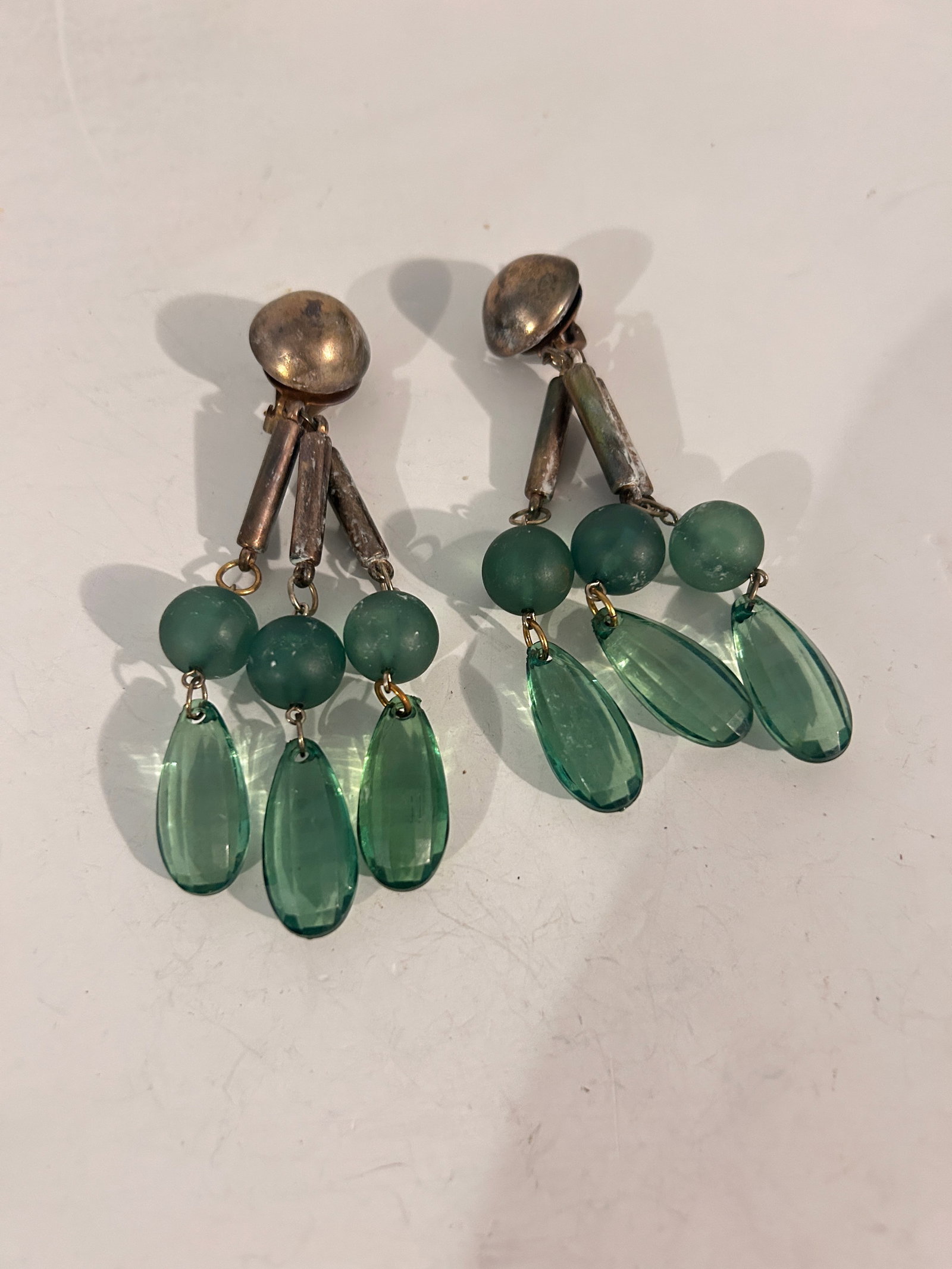 Vintage green Acrylic / Rhinestone Earrings: Vintage green Acrylic / Rhinestone Earrings Please view all photos as they are part of the description and condition of this Item, Feel free to contact me with questions or picture requests! Used Item