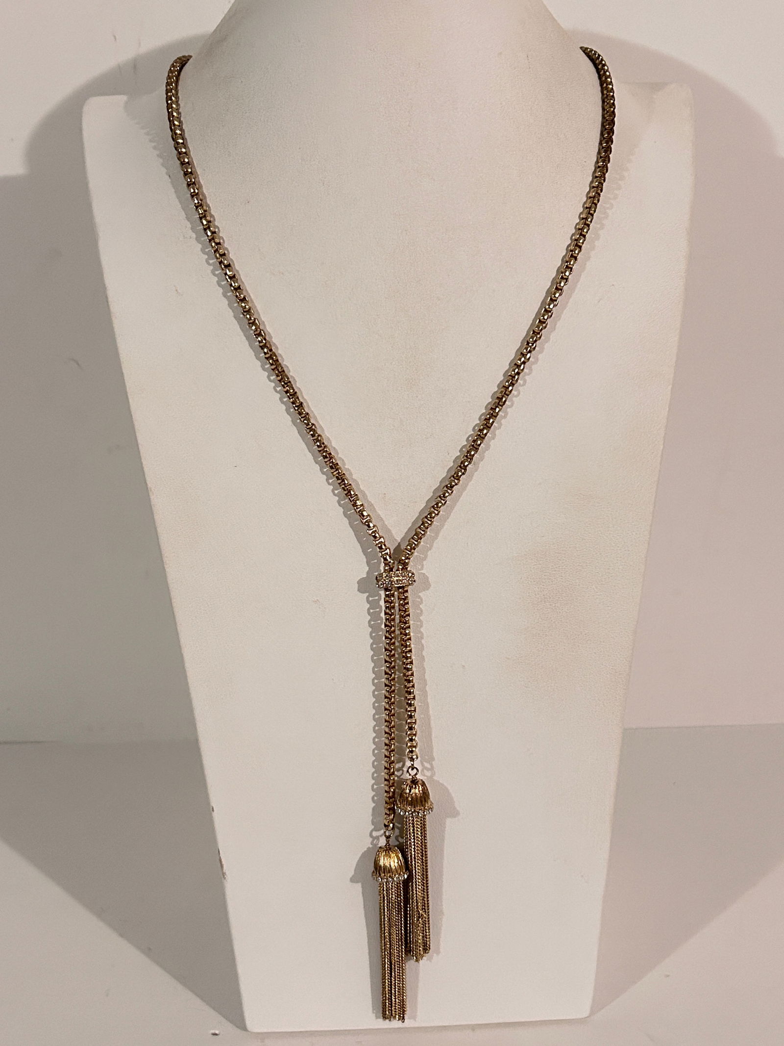 Vintage Gold tone Rhinestone double tassel Necklace Sz 30": Vintage Gold tone Rhinestone double tassel Necklace Sz 30" Please view all photos as they are part of the description and condition of this Item, Feel free to contact me with questions or picture requ