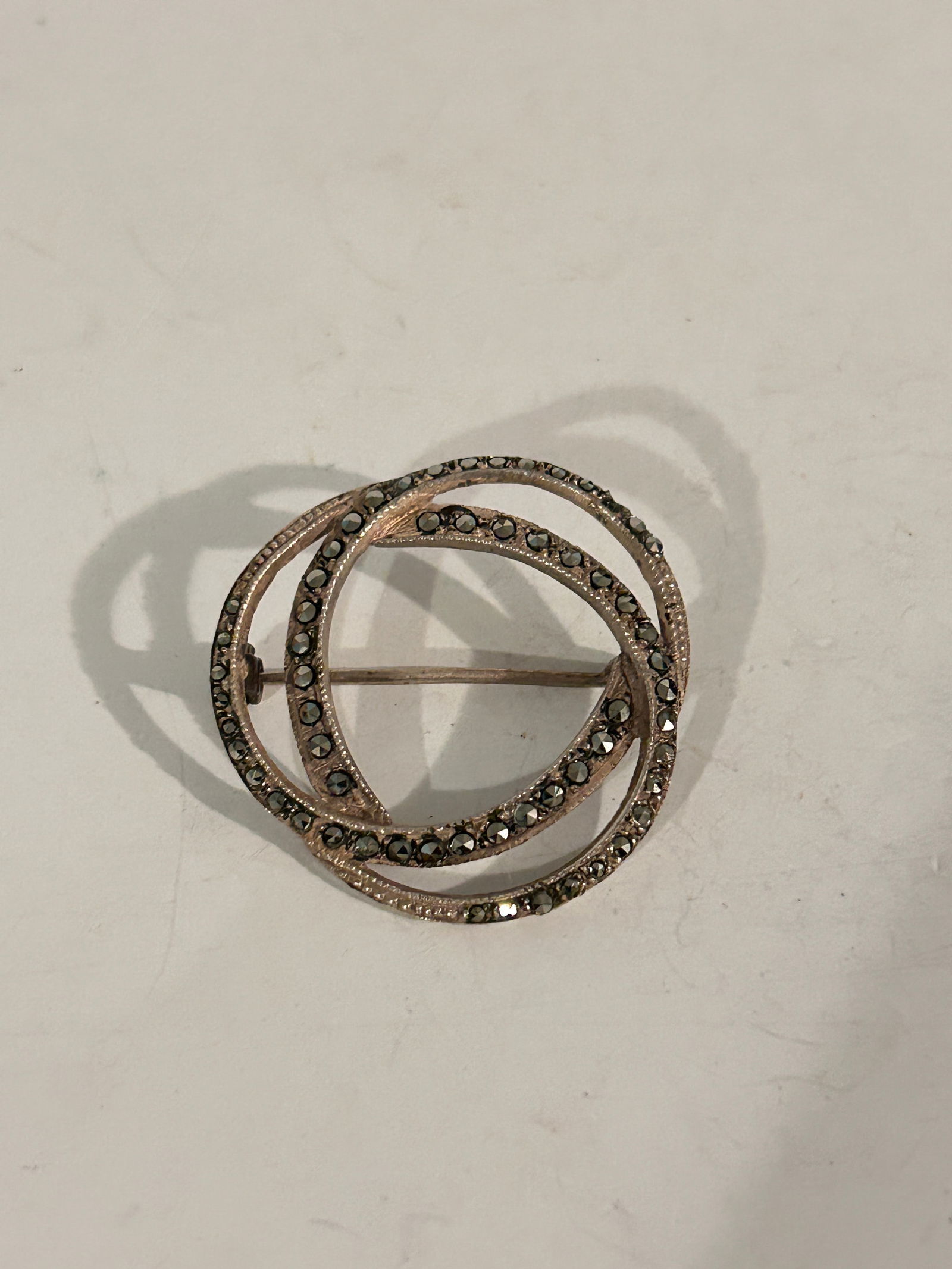 Vintage Sterling Silver Buma marcasite Brooch: Vintage Sterling Silver Buma marcasite Brooch Please view all photos as they are part of the description and condition of this Item, Feel free to contact me with questions or picture requests! Used It