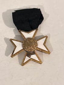 Vintage Masonic Knights Templar brass with white enamel medal on a black ribbon miising some enamel