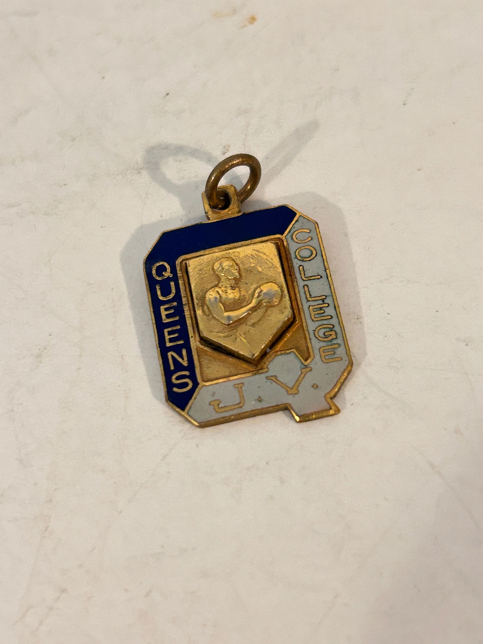 Vintage Queens College J.V. Basketball pendant: Vintage Queens College J.V. Basketball pendant Please view all photos as they are part of the description and condition of this Item, Feel free to contact me with questions or picture requests! Used I