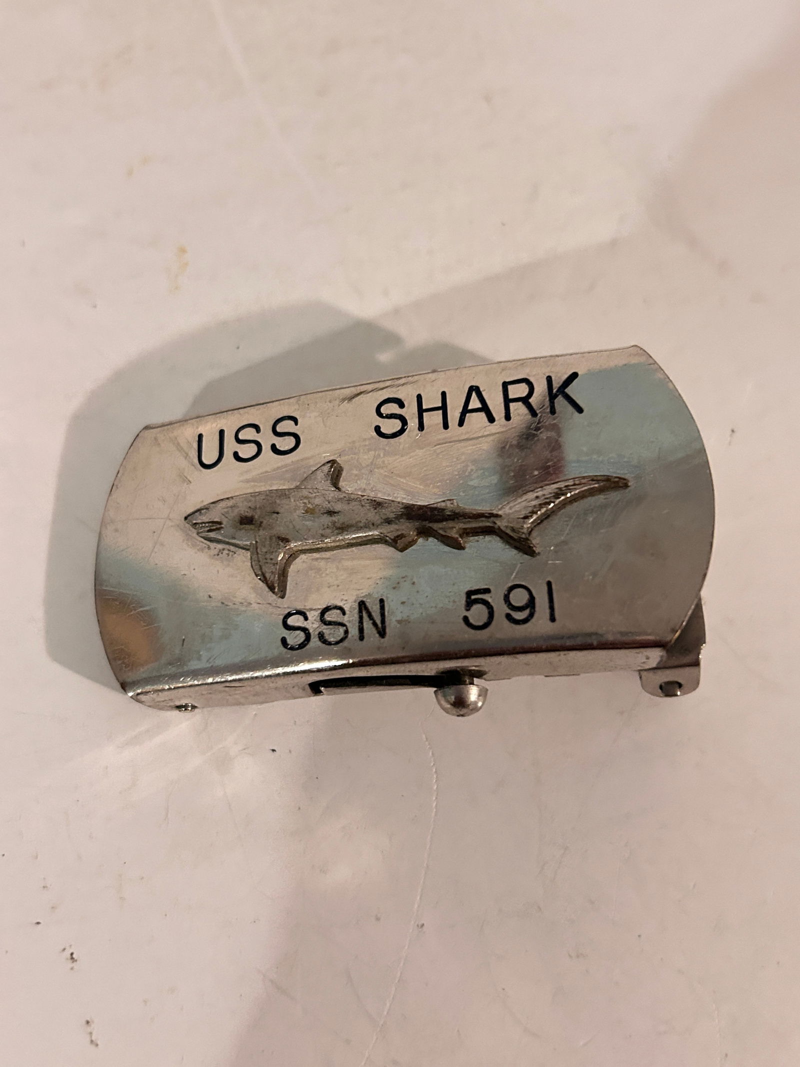 Vintage USS Navy Shark Belt Buckle: Vintage USS Navy Shark Belt Buckle Please view all photos as they are part of the description and condition of this Item, Feel free to contact me with questions or picture requests! Used Item AS IS