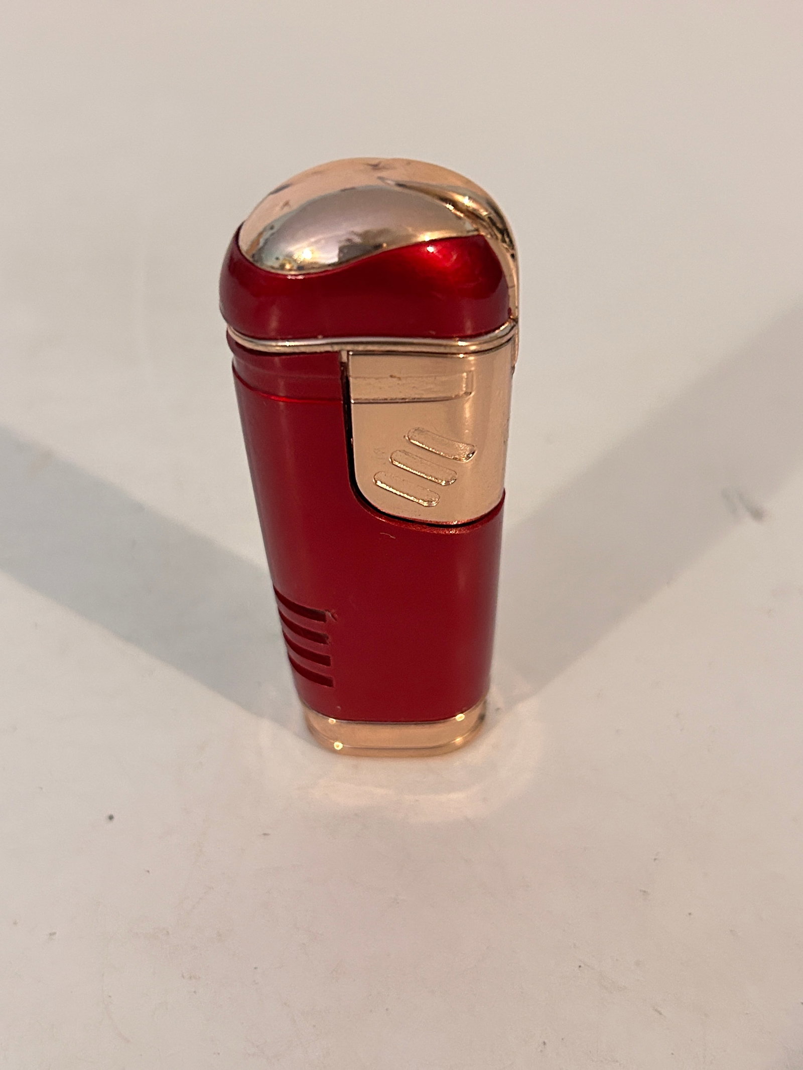 old red gas lighter: old red gas lighter Please view all photos as they are part of the description and condition of this Item, Feel free to contact me with questions or picture requests! Used Item AS IS