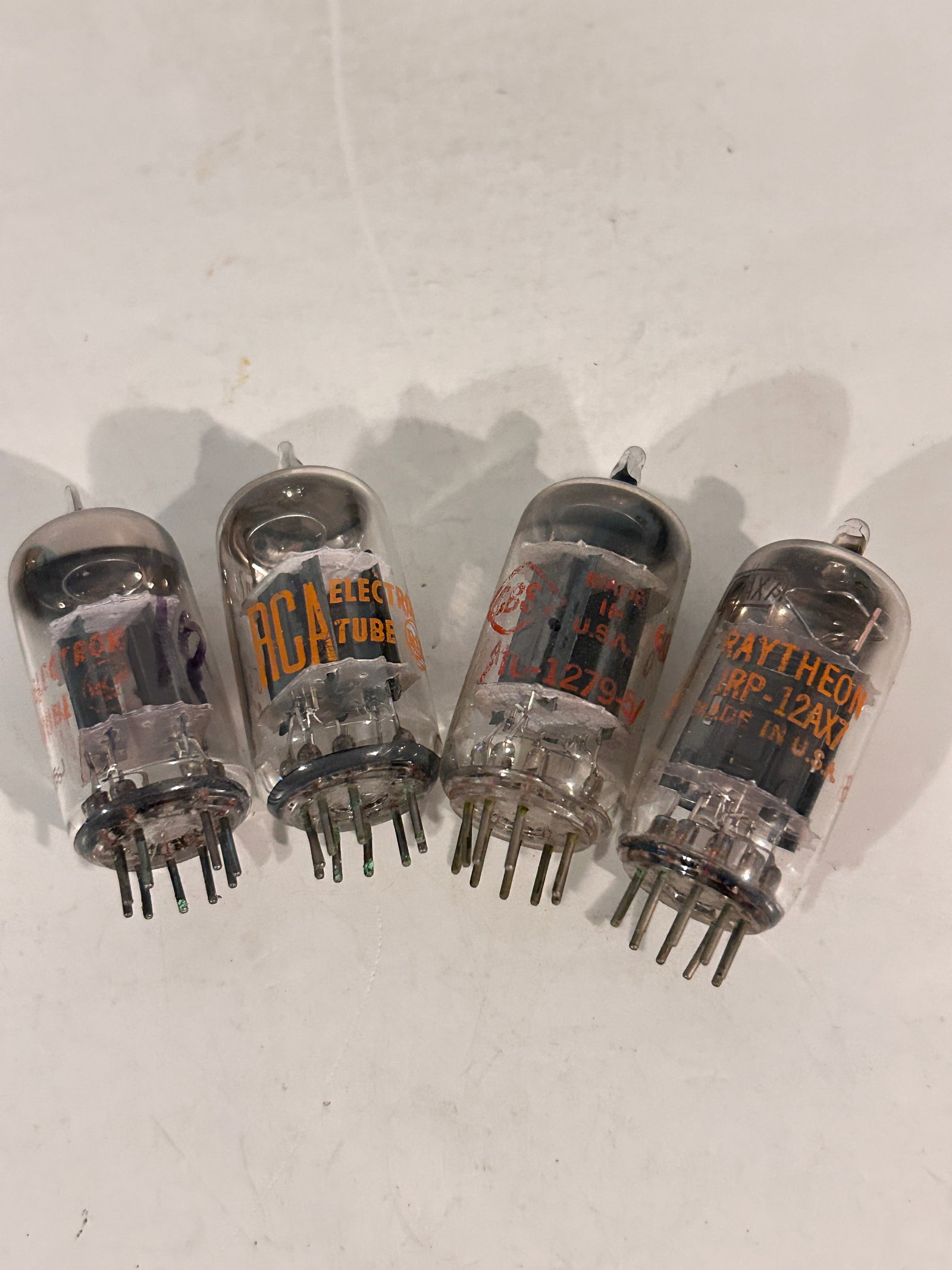 Vintage Lot of 4 Mixed 12AX7 Tubes: Vintage Lot of 4 Mixed 12AX7 Tubes Please view all photos as they are part of the description and condition of this Item, Feel free to contact me with questions or picture requests! Used Item AS IS