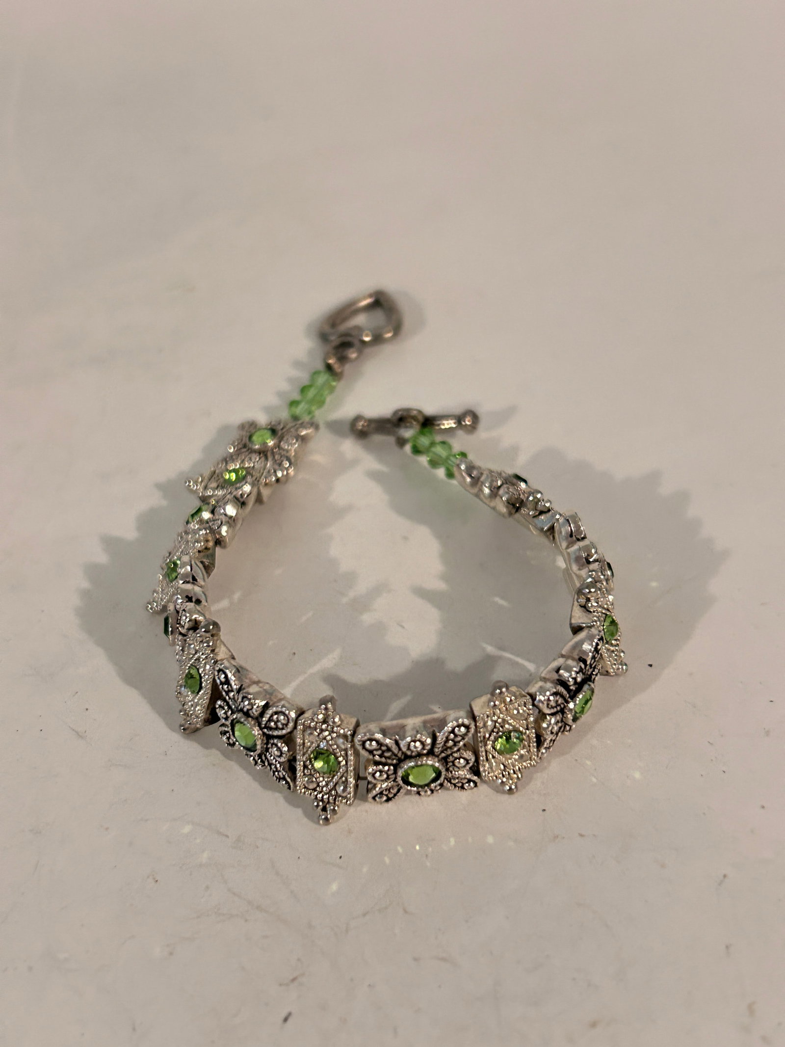 Vintage Swarovski green Bracelet 7": Vintage Swarovski green Bracelet 7" Please view all photos as they are part of the description and condition of this Item, Feel free to contact me with questions or picture requests! Used Item AS IS