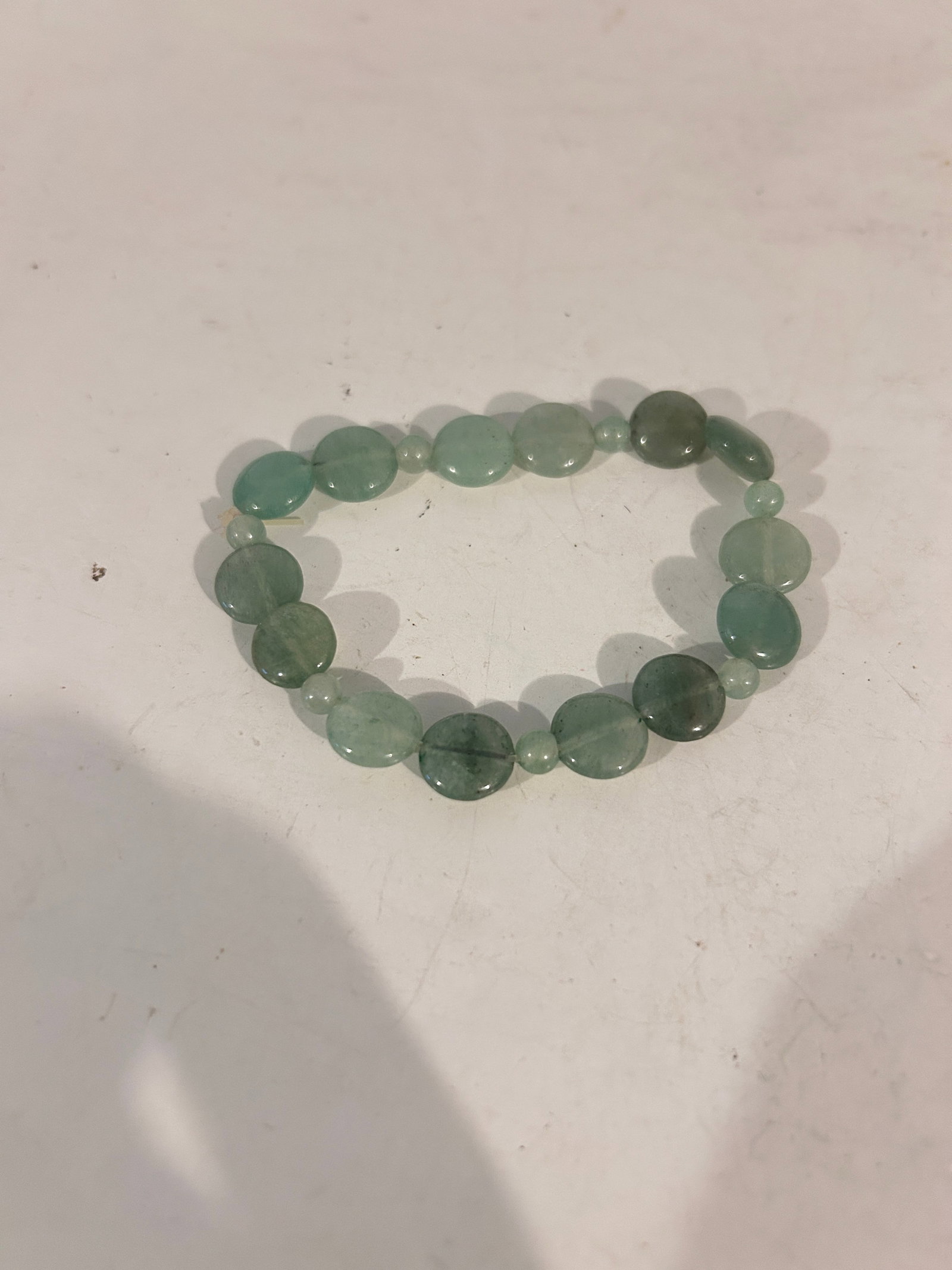 Vintage tested Jadite stretch Bracelet: Vintage tested Jadite stretch Bracelet Please view all photos as they are part of the description and condition of this Item, Feel free to contact me with questions or picture requests! Used Item AS I