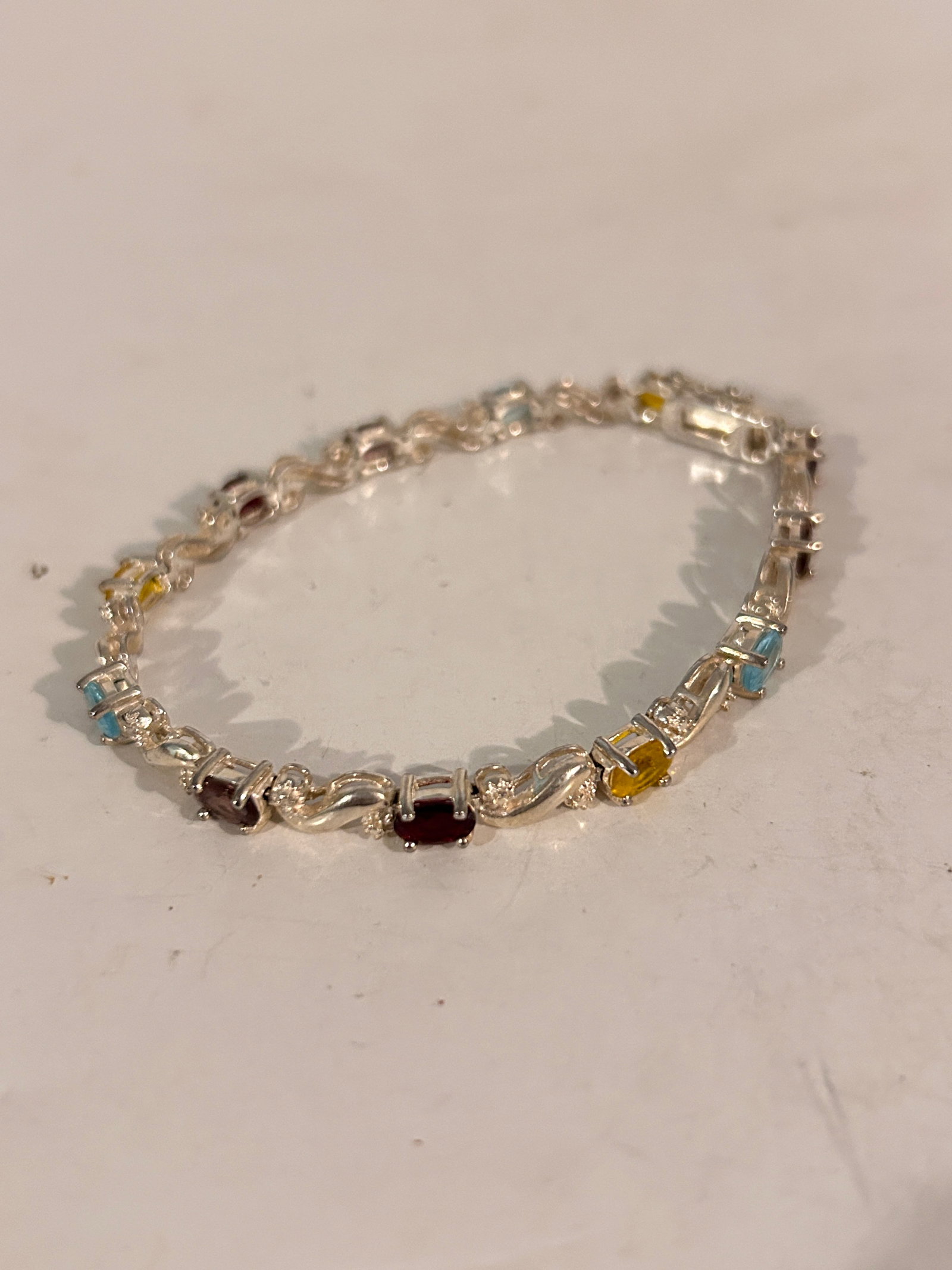 Vintage Sterling Silver colorful stones Bracelet 7": Vintage Sterling Silver colorful stones Bracelet 7" Please view all photos as they are part of the description and condition of this Item, Feel free to contact me with questions or picture requests! U