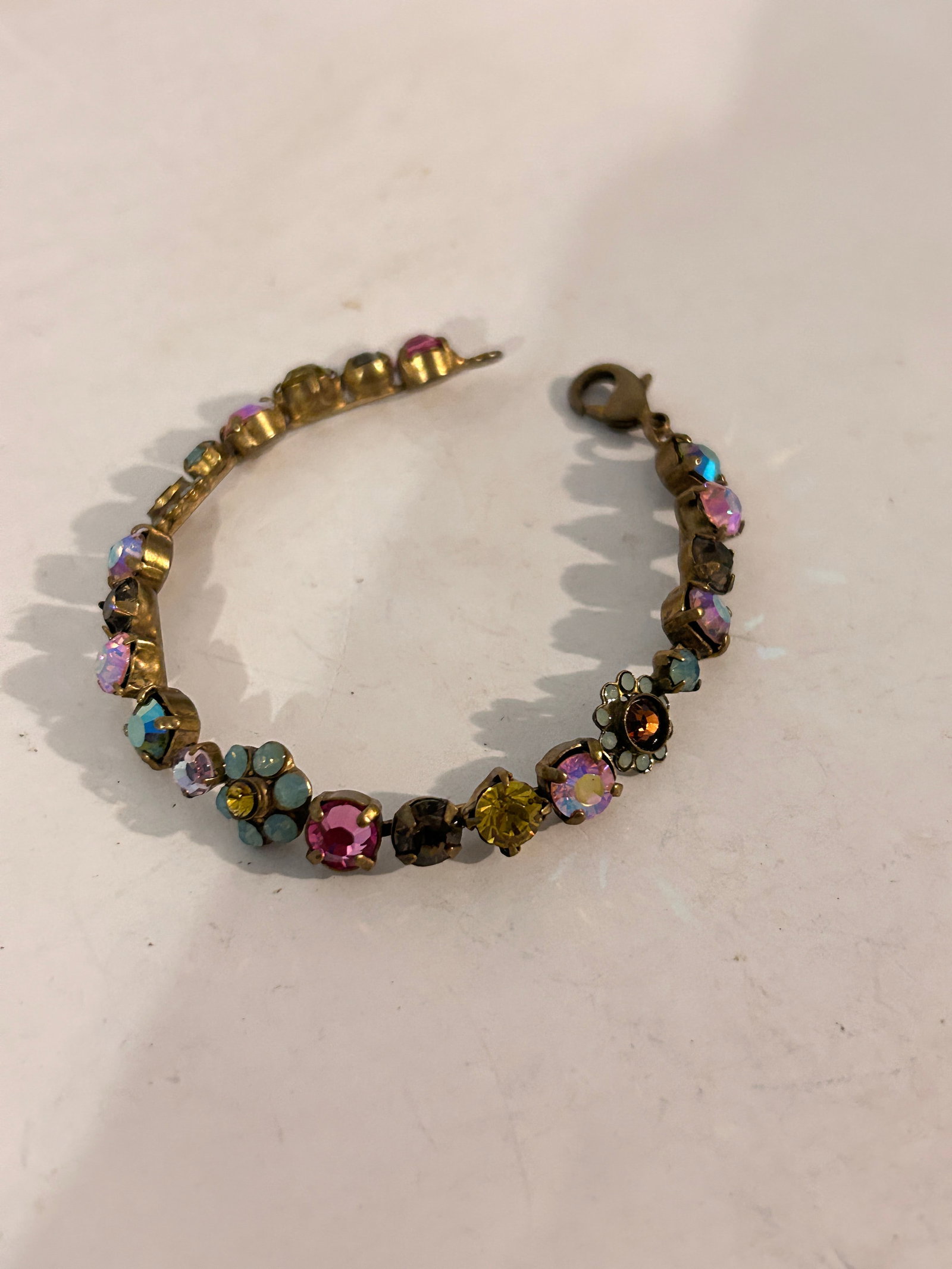 Vintage Sorrelli Multicolor Swarovski Crystal Tennis Bracelet 7": Vintage Sorrelli Multicolor Swarovski Crystal Tennis Bracelet 7" Please view all photos as they are part of the description and condition of this Item, Feel free to contact me with questions or pictur
