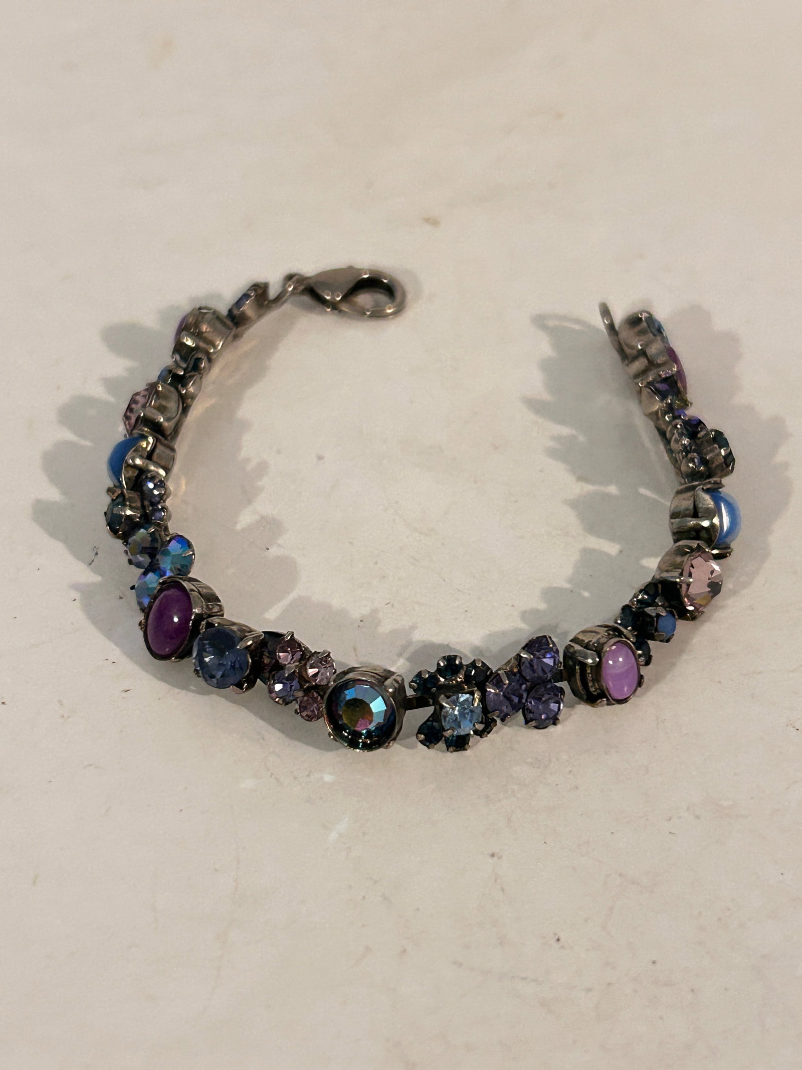 Vintage Sorrelli Multicolor Swarovski Crystal Tennis Bracelet 7": Vintage Sorrelli Multicolor Swarovski Crystal Tennis Bracelet 7" Please view all photos as they are part of the description and condition of this Item, Feel free to contact me with questions or pictur