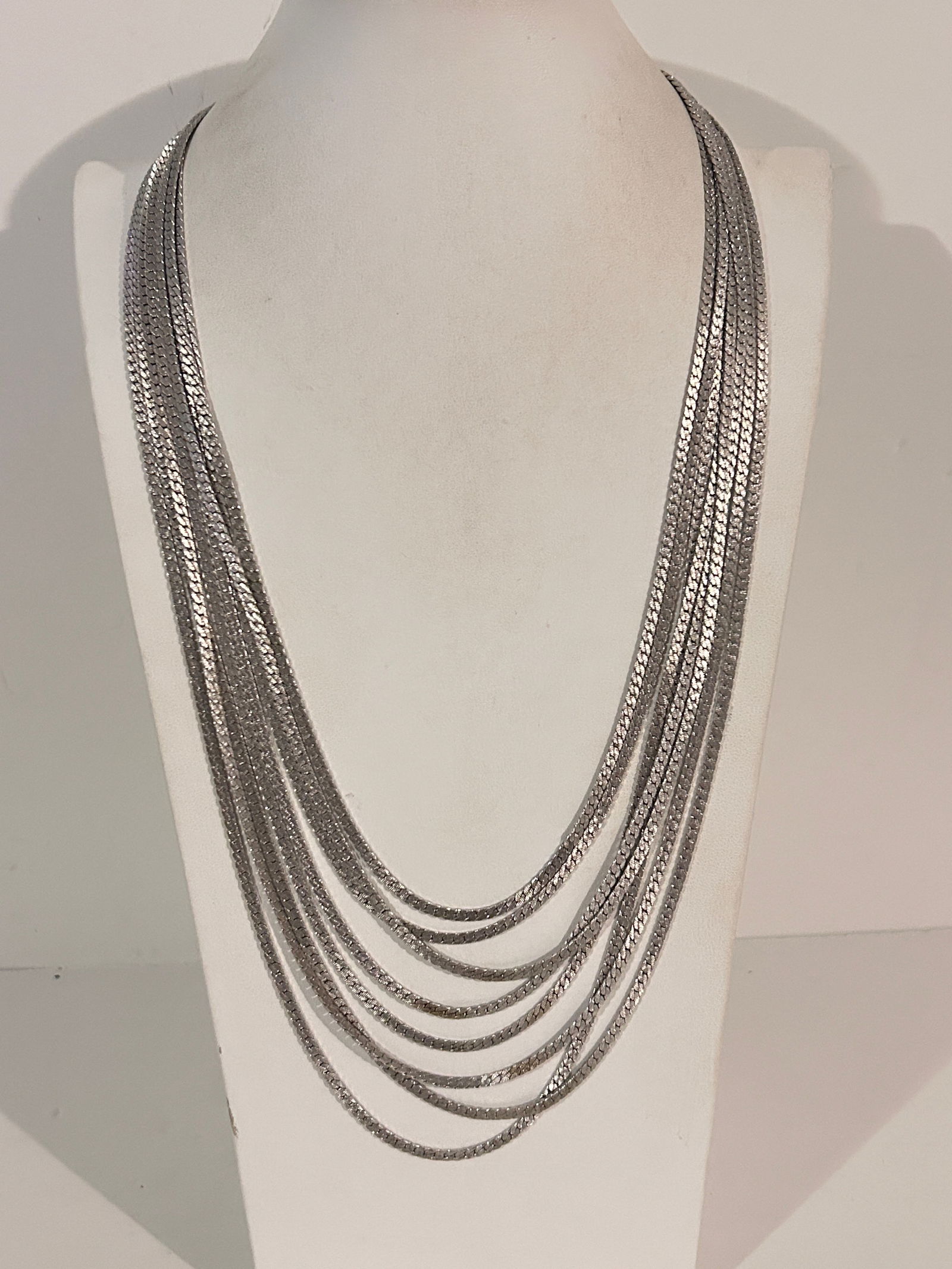 Vintage Silvertone Monet 8 strand Necklace 25": Vintage Silvertone Monet 8 strand Necklace 25" Please view all photos as they are part of the description and condition of this Item, Feel free to contact me with questions or picture requests! Used I