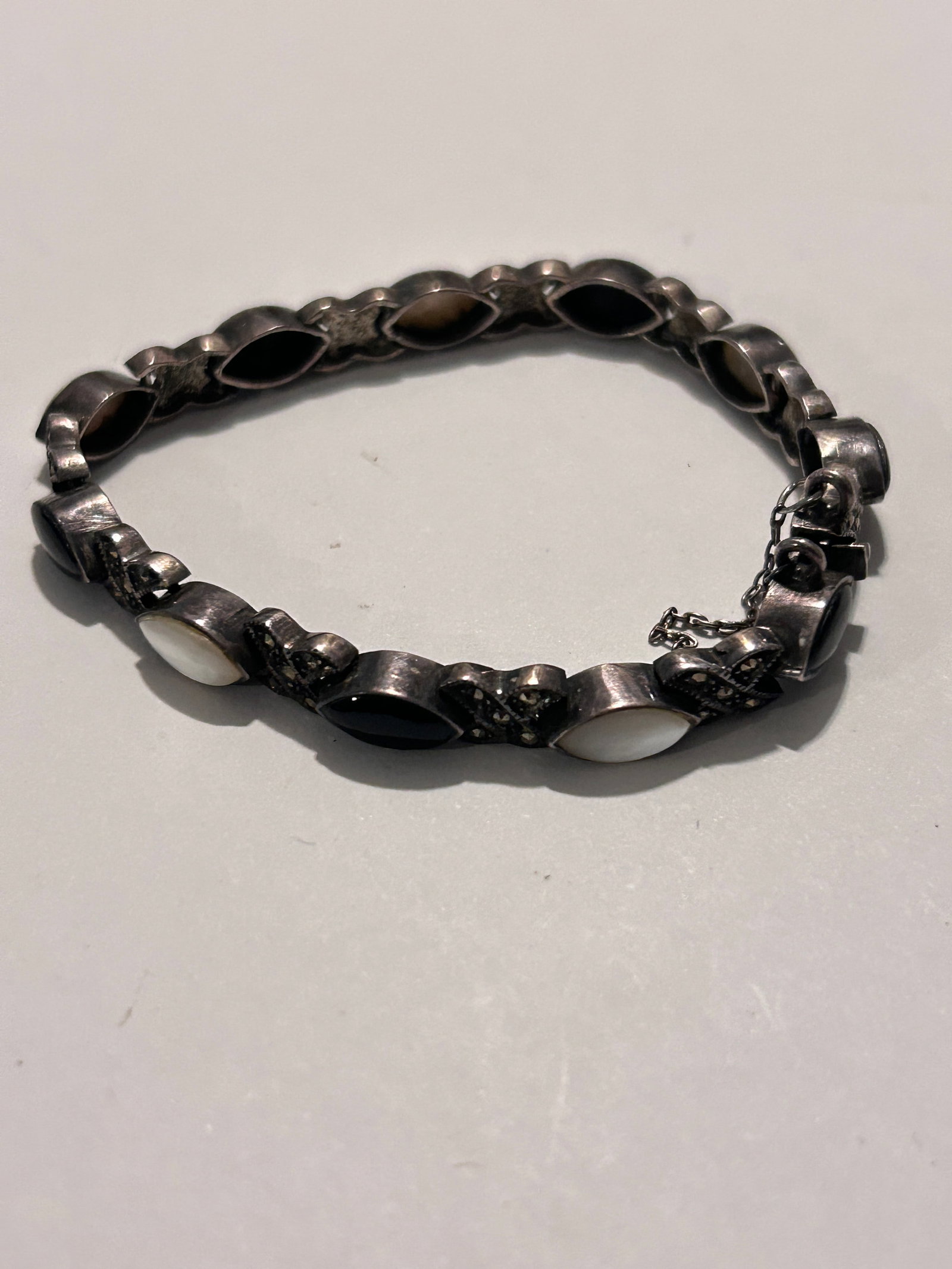 Vintage Sterling Silver Mother of Pearl Onyx Bracelet 7": Vintage Sterling Silver Mother of Pearl Onyx Bracelet 7" Please view all photos as they are part of the description and condition of this Item, Feel free to contact me with questions or picture reques