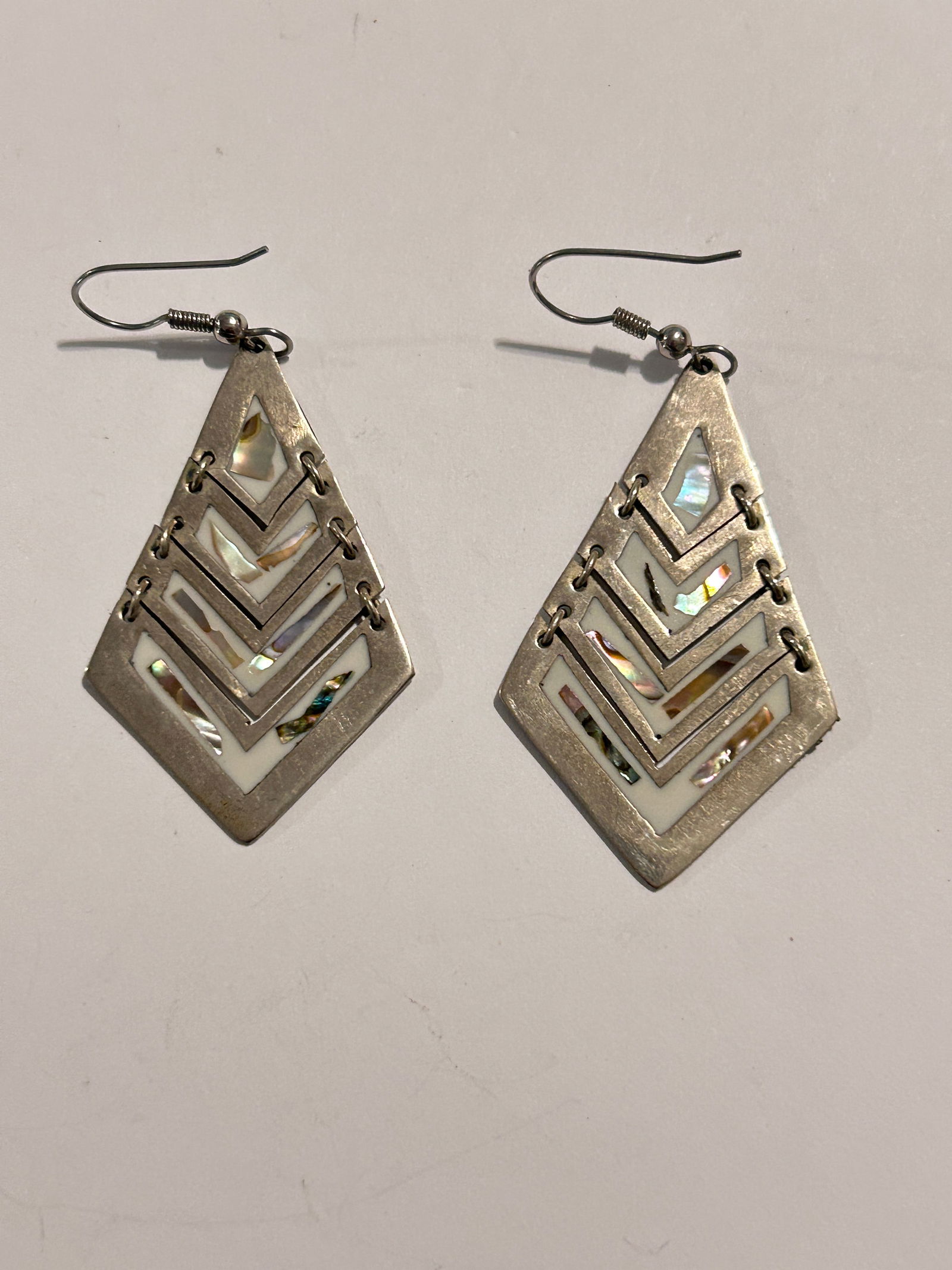 Vintage Alpaca Abalone Silver Earrings: Vintage Alpaca Abalone Silver Earrings Please view all photos as they are part of the description and condition of this Item, Feel free to contact me with questions or picture requests! Used Item AS I