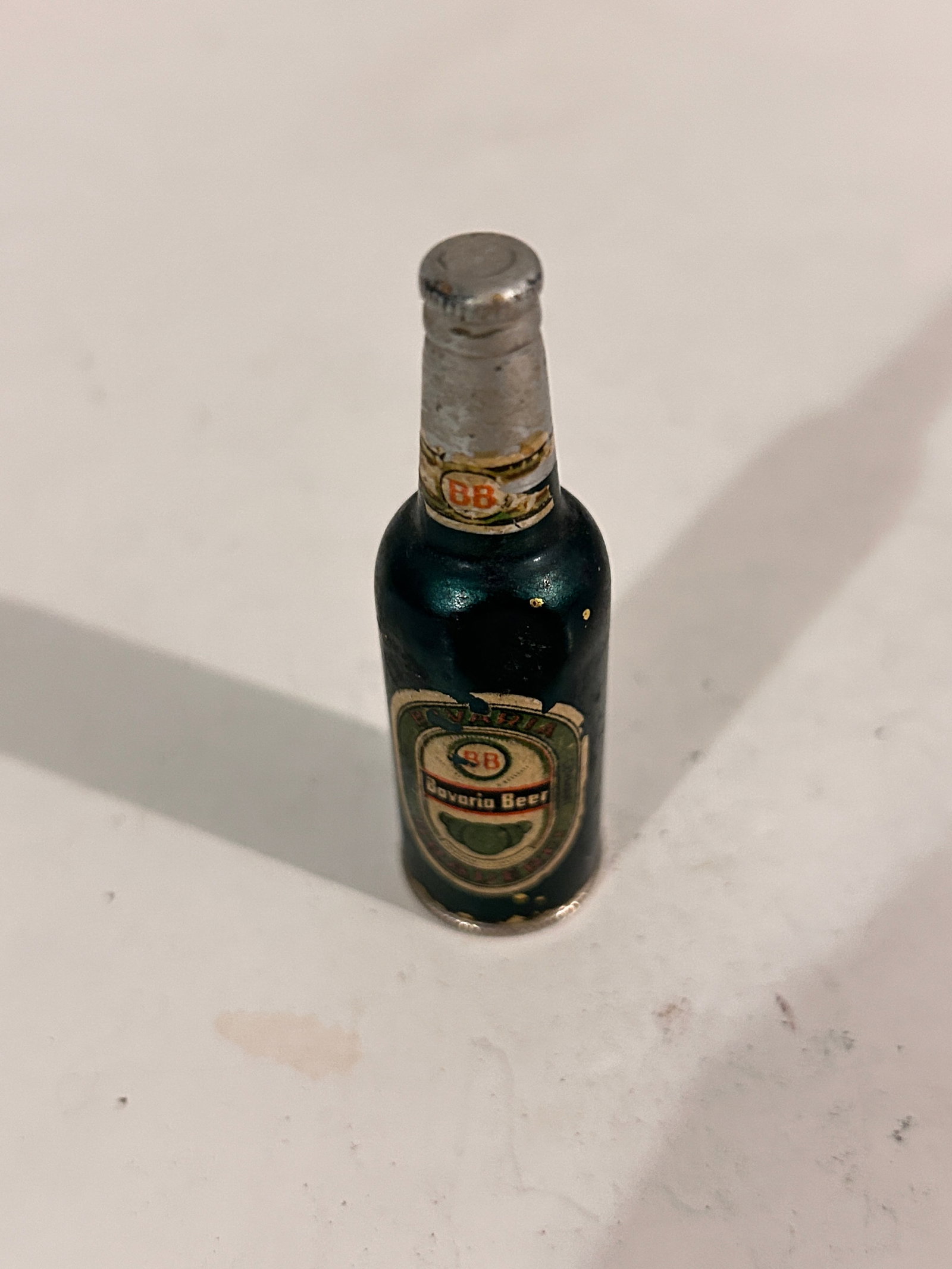 Vintage Metal Mini Beer Bottle Lighter: Vintage Metal Mini Beer Bottle Lighter Please view all photos as they are part of the description and condition of this Item, Feel free to contact me with questions or picture requests! Used Item AS I