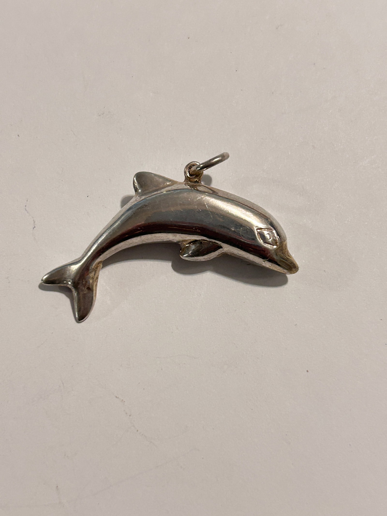 Vintage Sterling Silver Dolphin Pendant: Vintage Sterling Silver Dolphin Pendant Please view all photos as they are part of the description and condition of this Item, Feel free to contact me with questions or picture requests! Used Item AS 