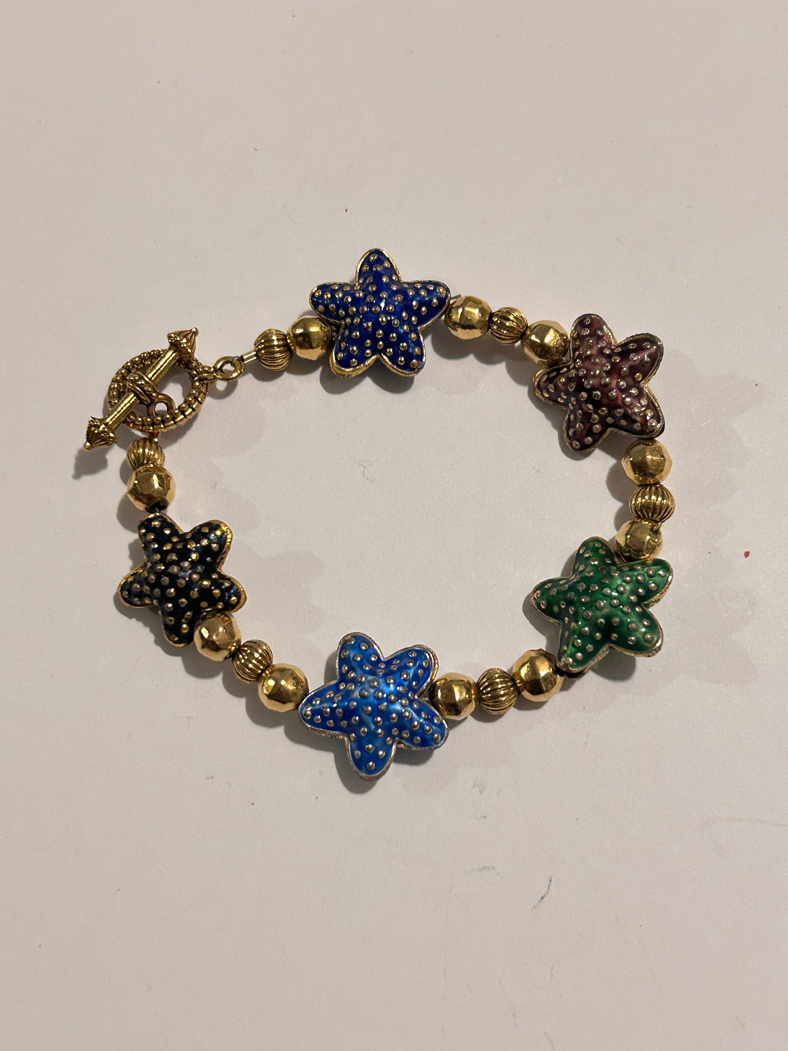 Vintage Star Fish colorful Bracelet 7": Vintage Star Fish colorful Bracelet 7" Please view all photos as they are part of the description and condition of this Item, Feel free to contact me with questions or picture requests! Used Item AS I