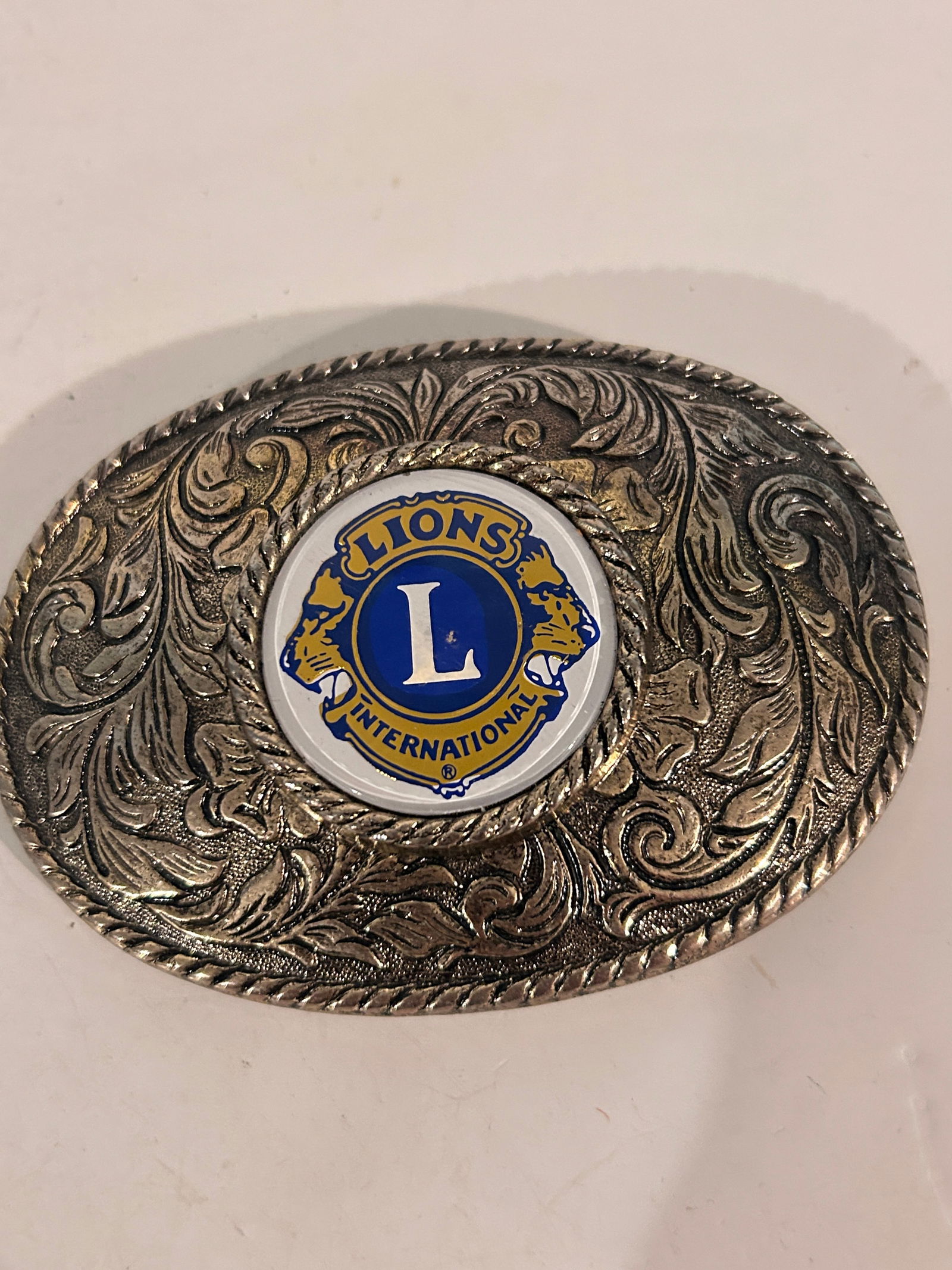 Vintage Lions Club Belt Buckle: Vintage Lions Club Belt Buckle Please view all photos as they are part of the description and condition of this Item, Feel free to contact me with questions or picture requests! Used Item AS IS