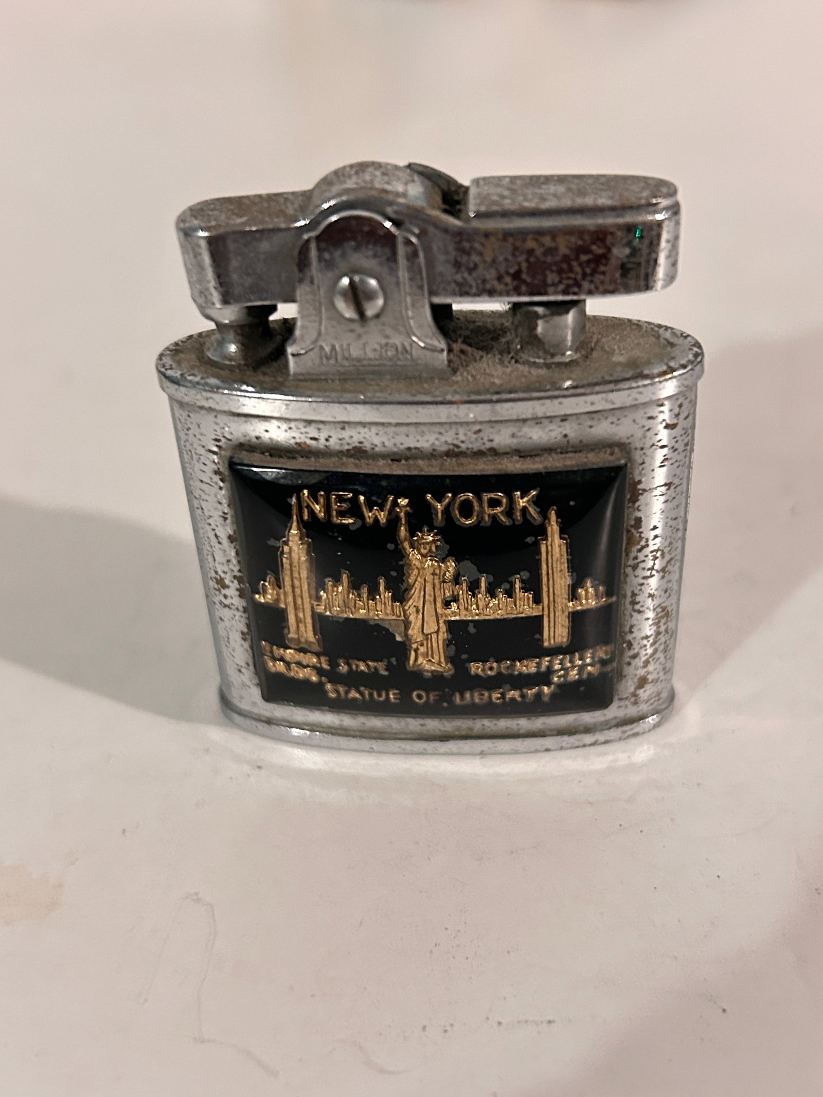 Vintage Million Fire-Master lighter: Vintage Million Fire-Master lighter Please view all photos as they are part of the description and condition of this Item, Feel free to contact me with questions or picture requests! Used Item AS IS