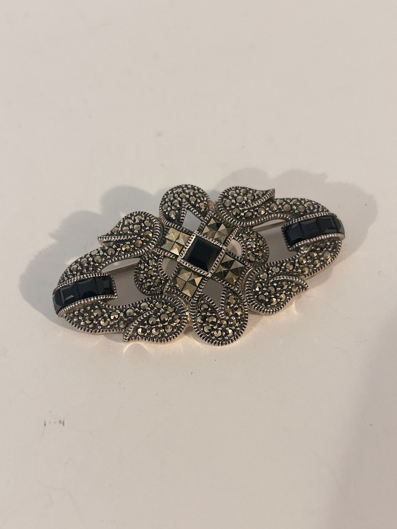 Vintage Sterling Silver Onyx Marcasite JJ judith jack Brooch: Vintage Sterling Silver Onyx Marcasite JJ judith jack Brooch Please view all photos as they are part of the description and condition of this Item, Feel free to contact me with questions or picture re