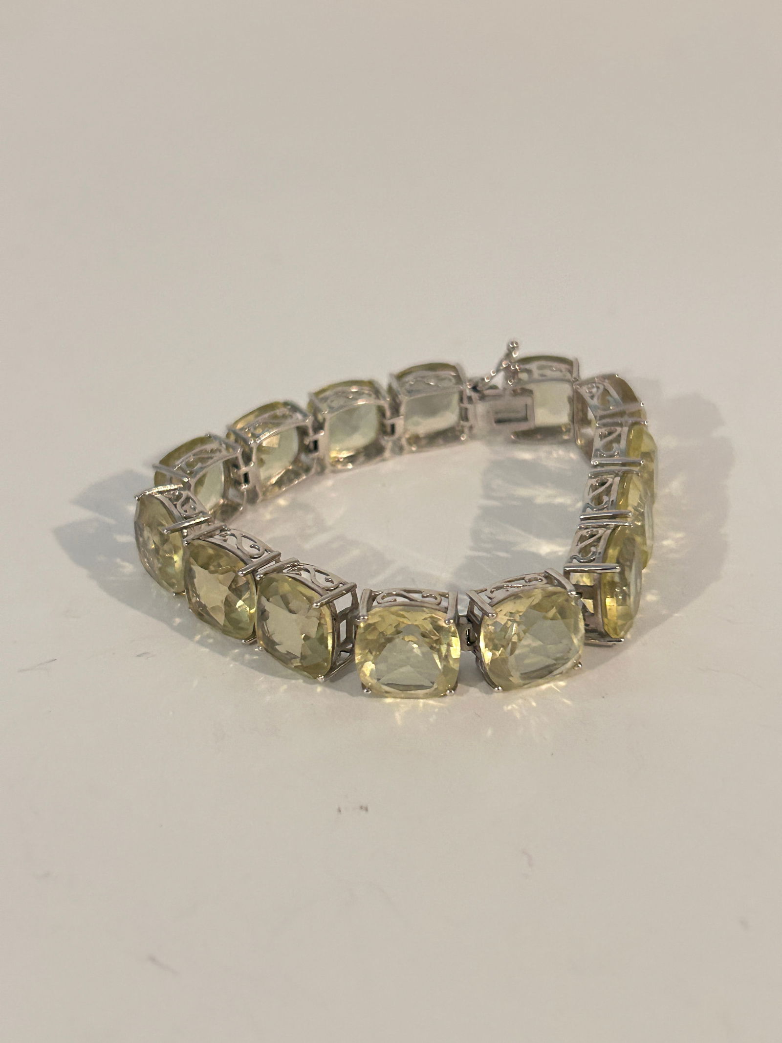 BBJ Sterling Silver Large Stone Yellow Spinel Tested Tennis Bracelet 7 1/2": BBJ Sterling Silver Large Stone Yellow Spinel Tested Tennis Bracelet 7 1/2" Please view all photos as they are part of the description and condition of this Item, Feel free to contact me with question