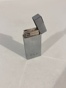 Vintage Colibri Touch Sensor Lighter has inscription on it