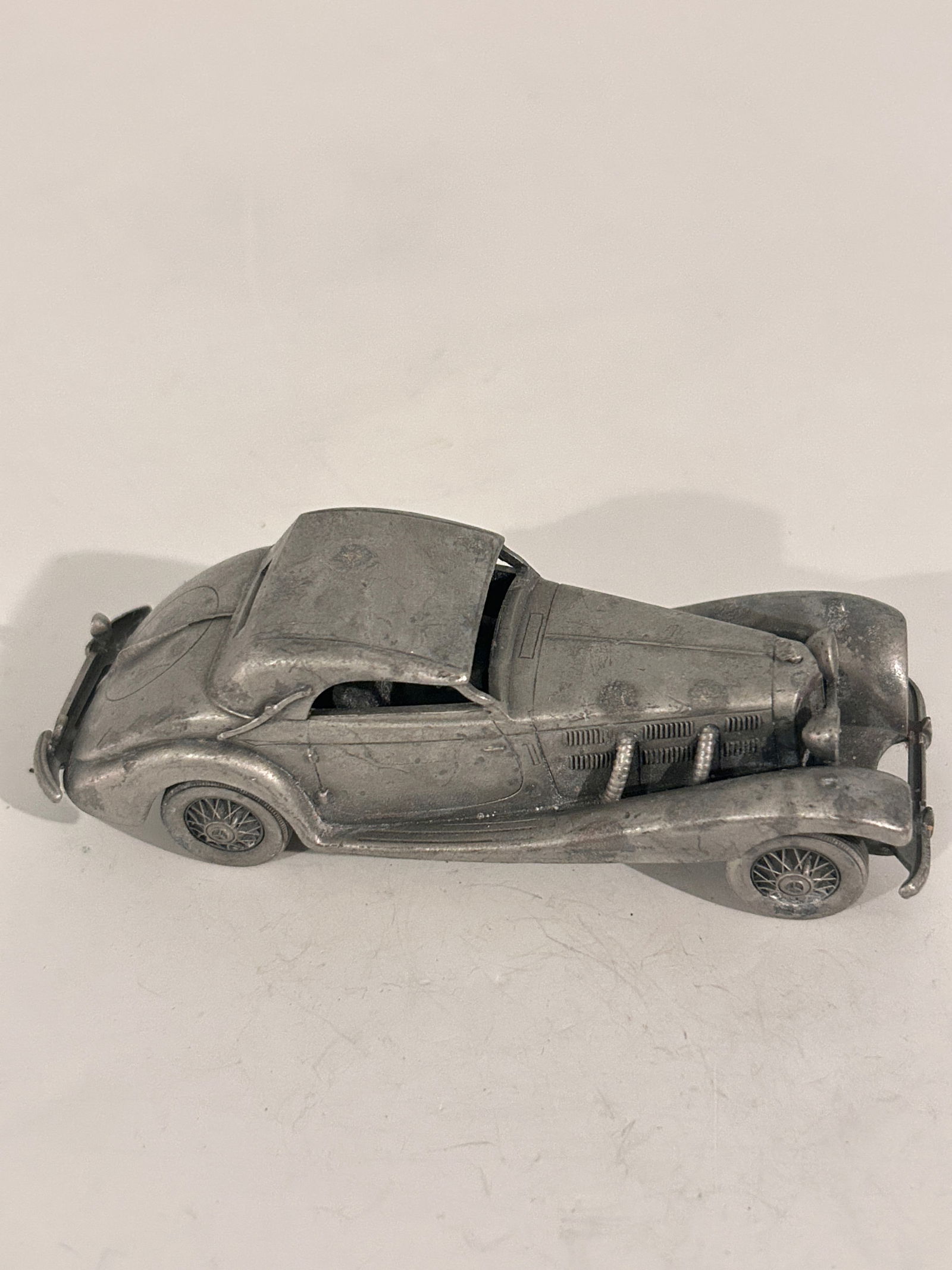 Vintage The Danbury Mint Classic Pewter Car 1931 daimler: Item comes exactly as shown Know what you are bidding on. Carefully refer to and examine all photos, ask questions, do research, etc., to determine (Authinticity) . before bidding in order to determin