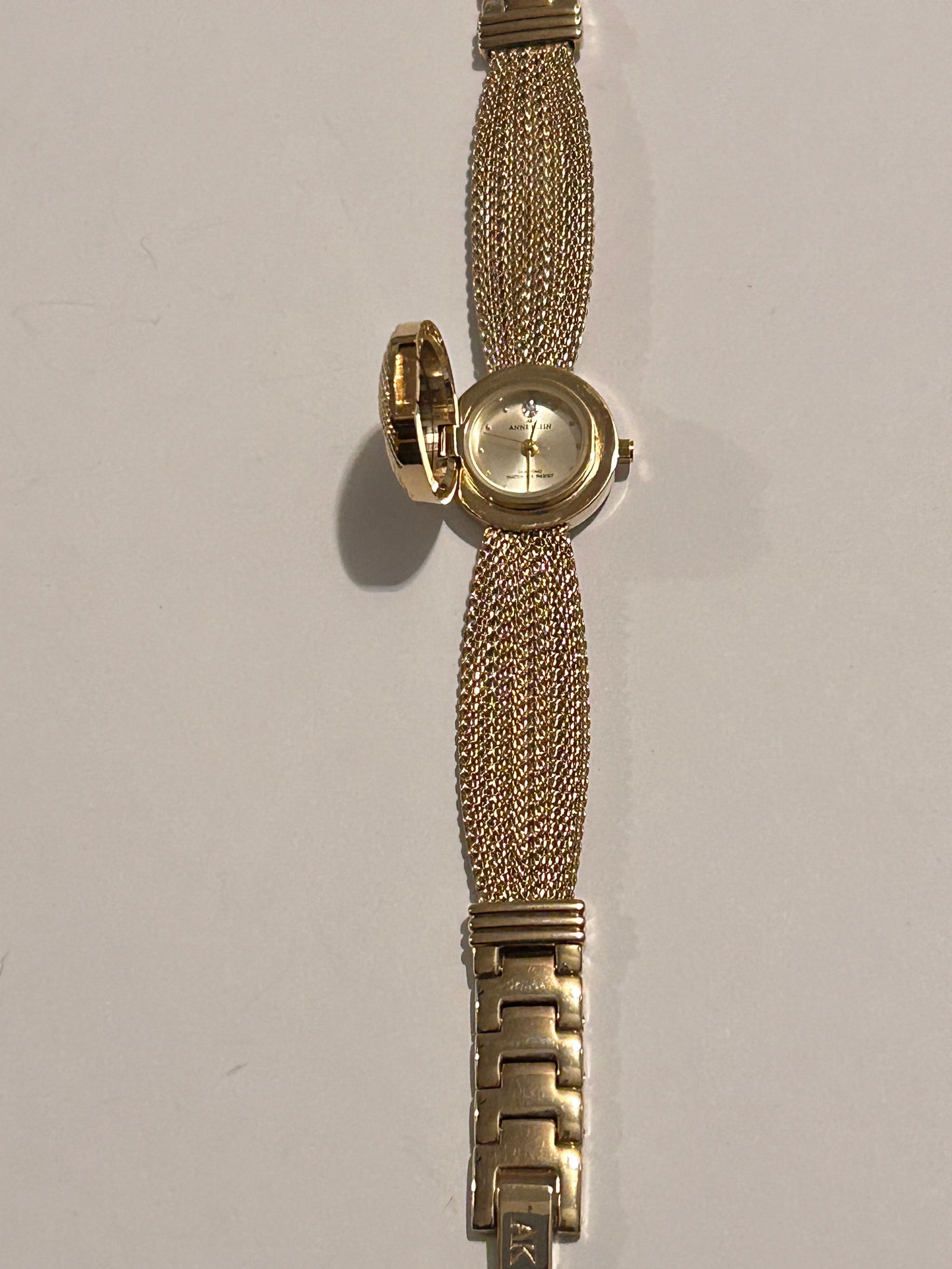 Vintage locket type Anne Klein Goldtone Mesh Watch w/ Diamond Dial, tested/works: Vintage locket type Anne Klein Goldtone Mesh Watch w/ Diamond Dial, tested/works Please view all photos as they are part of the description and condition of this Item, Feel free to contact me with que