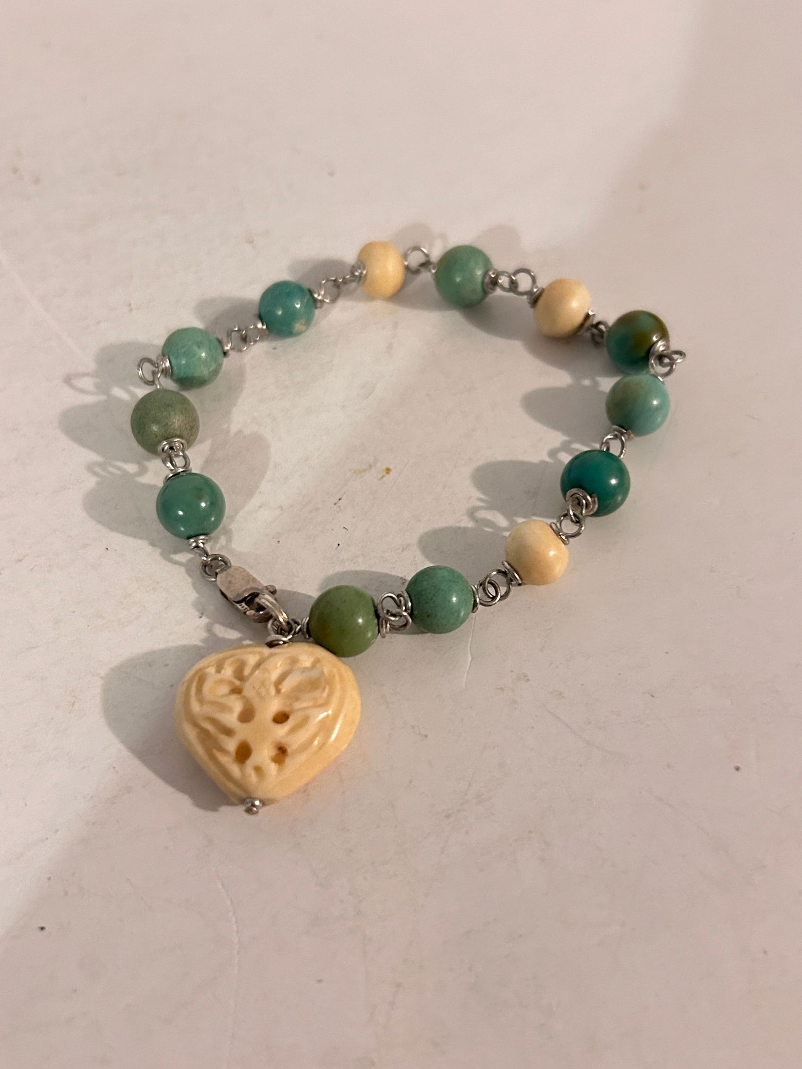 Vintage Sterling Silver bead heart Bracelet 7": Vintage Sterling Silver bead heart Bracelet 7" Please view all photos as they are part of the description and condition of this Item, Feel free to contact me with questions or picture requests! Used I