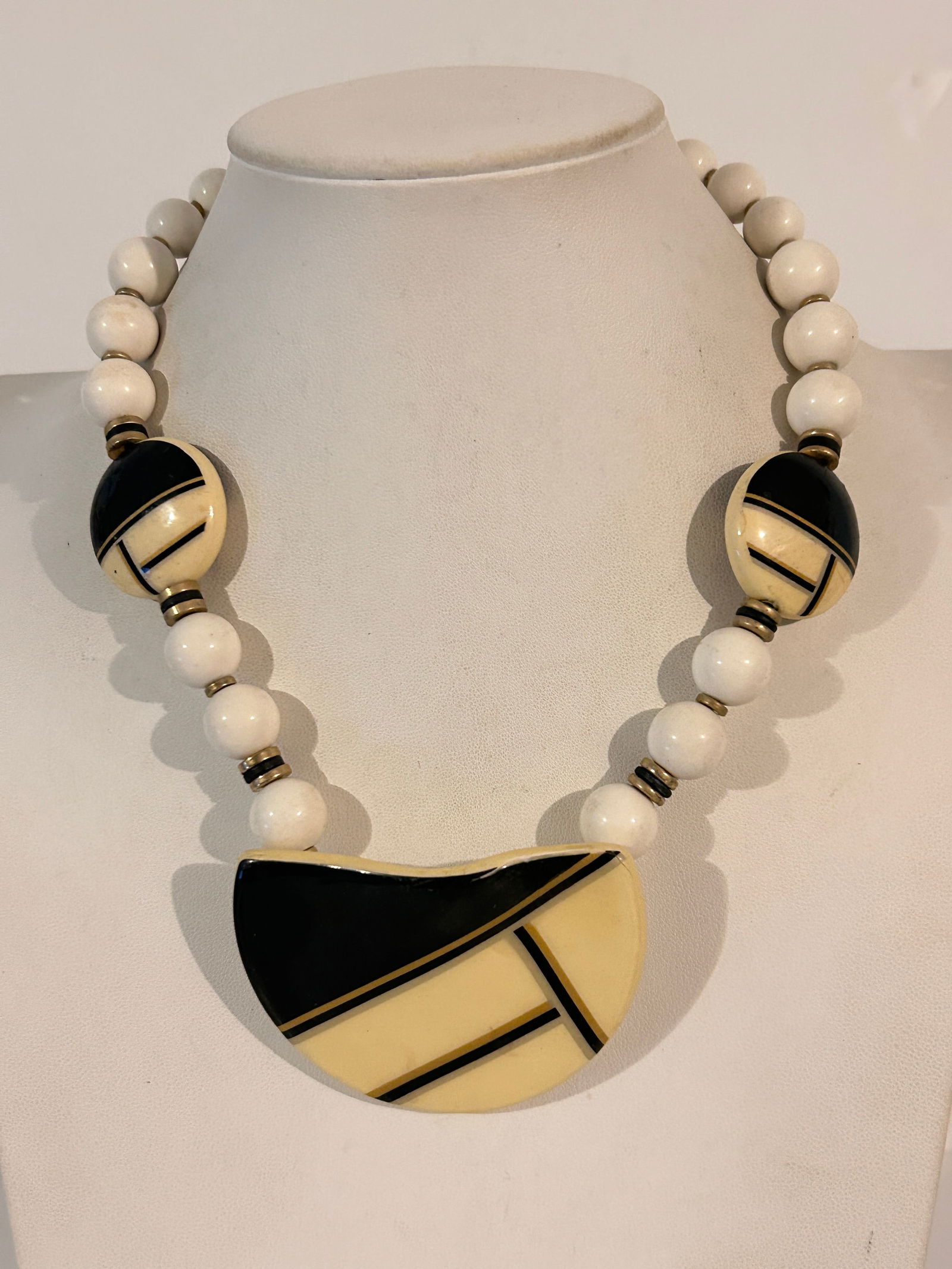 Vintage 1980s ceramic stylized bib necklace with black and off-white geometric designs 16": Vintage 1980s ceramic stylized bib necklace with black and off-white geometric designs 16" Please view all photos as they are part of the description and condition of this Item, Feel free to contact m