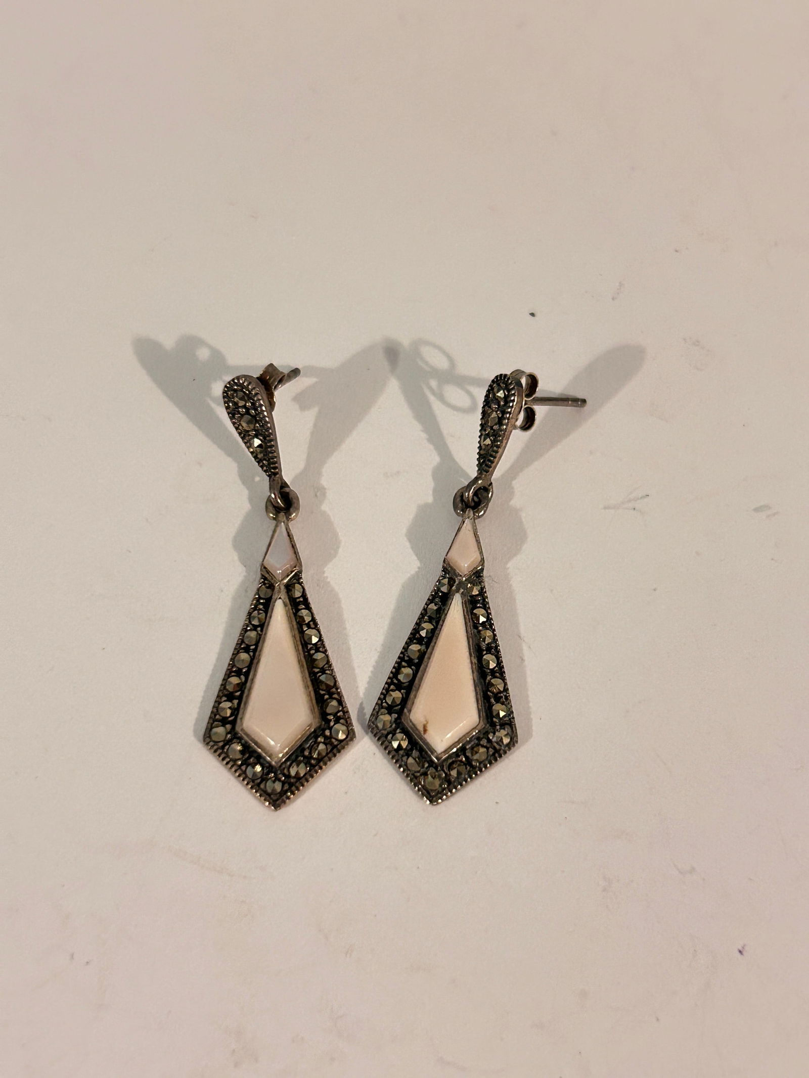 Vintage Sterling Silver marcasite mother of pearl Earrings: Vintage Sterling Silver marcasite mother of pearl Earrings Please view all photos as they are part of the description and condition of this Item, Feel free to contact me with questions or picture requ