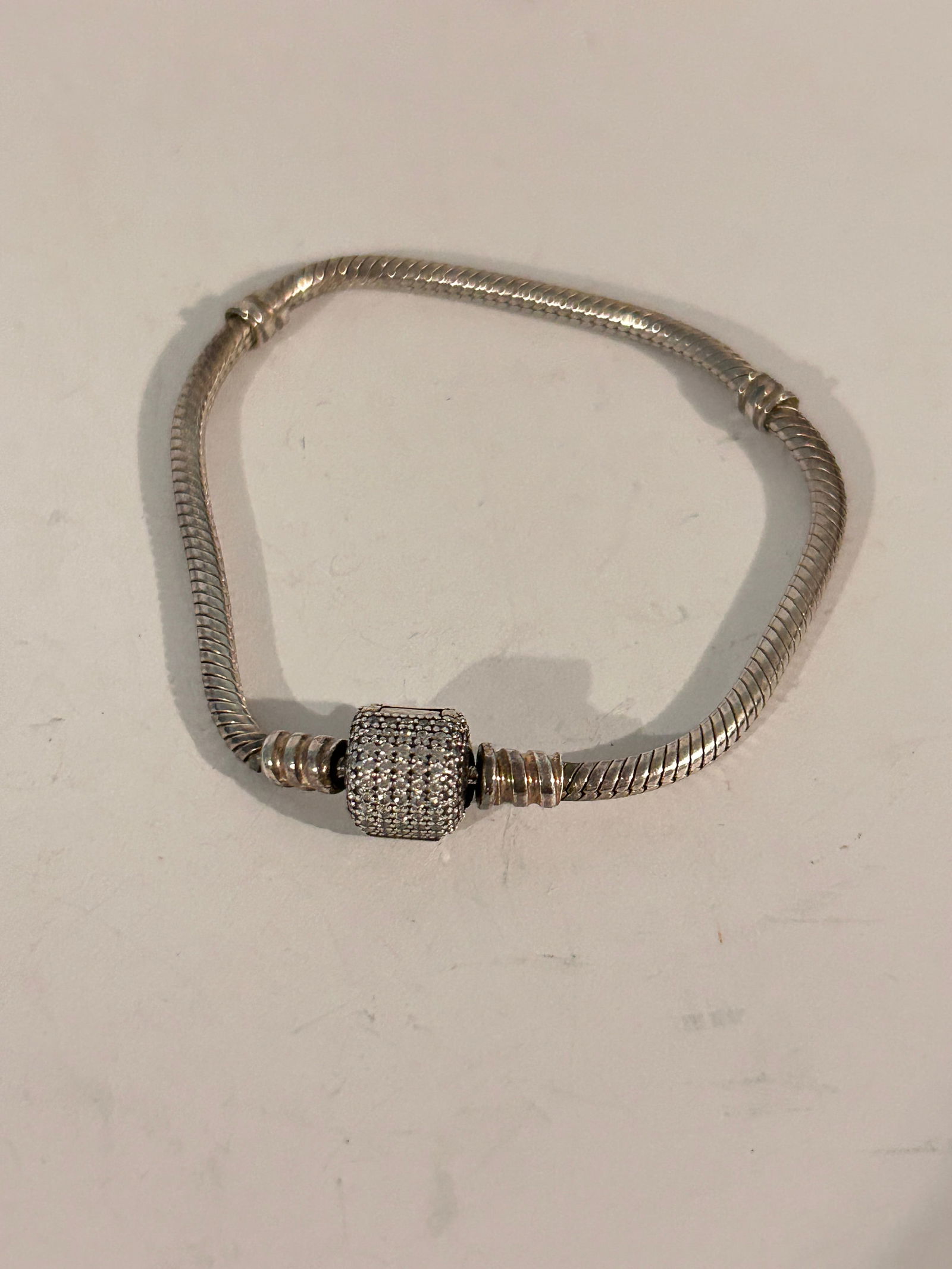 Authentic Pandora 6.7" Silver CZ Barrel Clasp Charm Bracelet: Authentic Pandora 6.7" Silver CZ Barrel Clasp Charm Bracelet Please view all photos as they are part of the description and condition of this Item, Feel free to contact me with questions or picture re