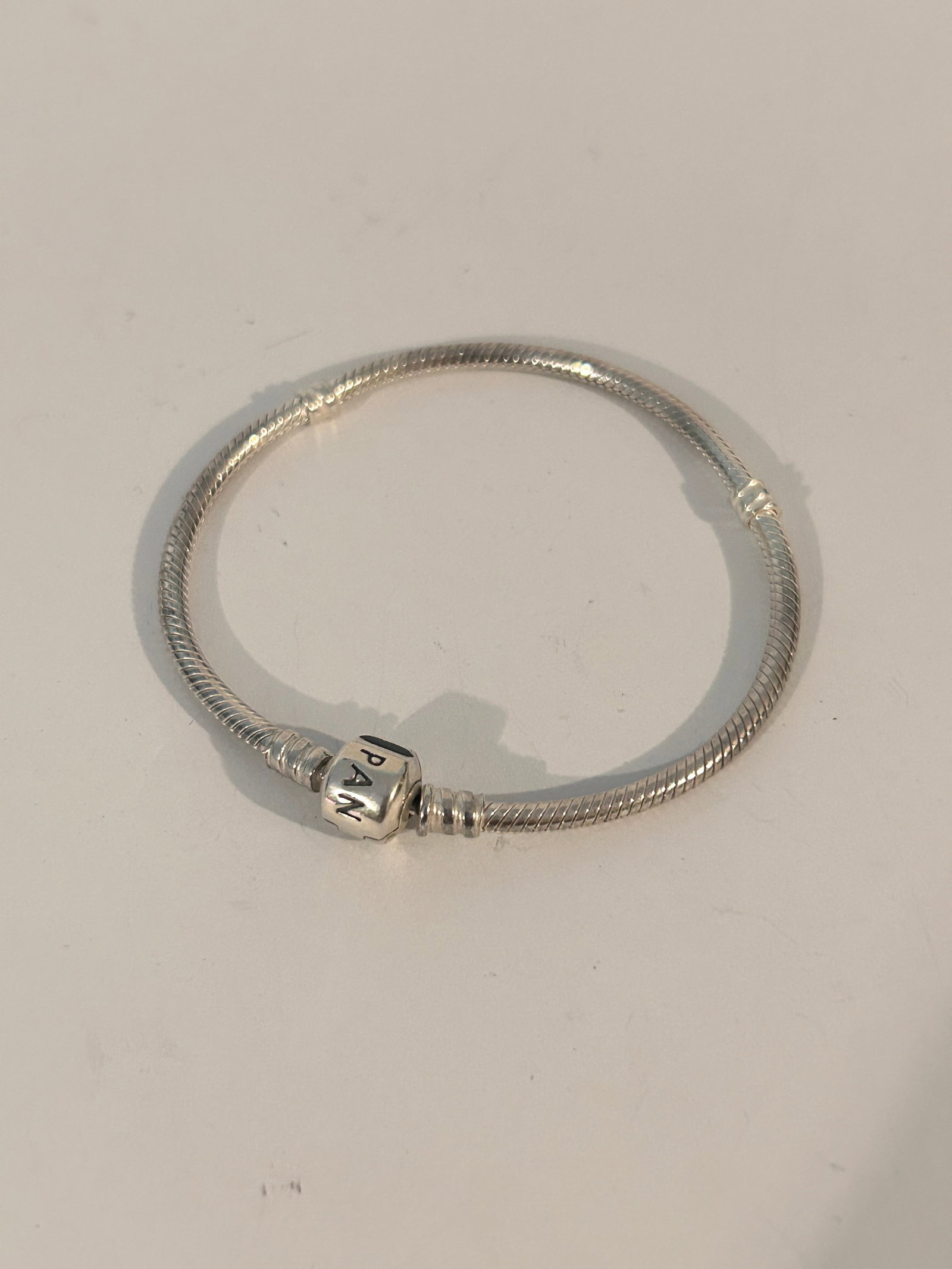 Vintage Pandora Sterling Silver Pandora 925 Bracelet 7 1/2": Vintage Pandora Sterling Silver Pandora 925 Bracelet 7 1/2" Please view all photos as they are part of the description and condition of this Item, Feel free to contact me with questions or picture req
