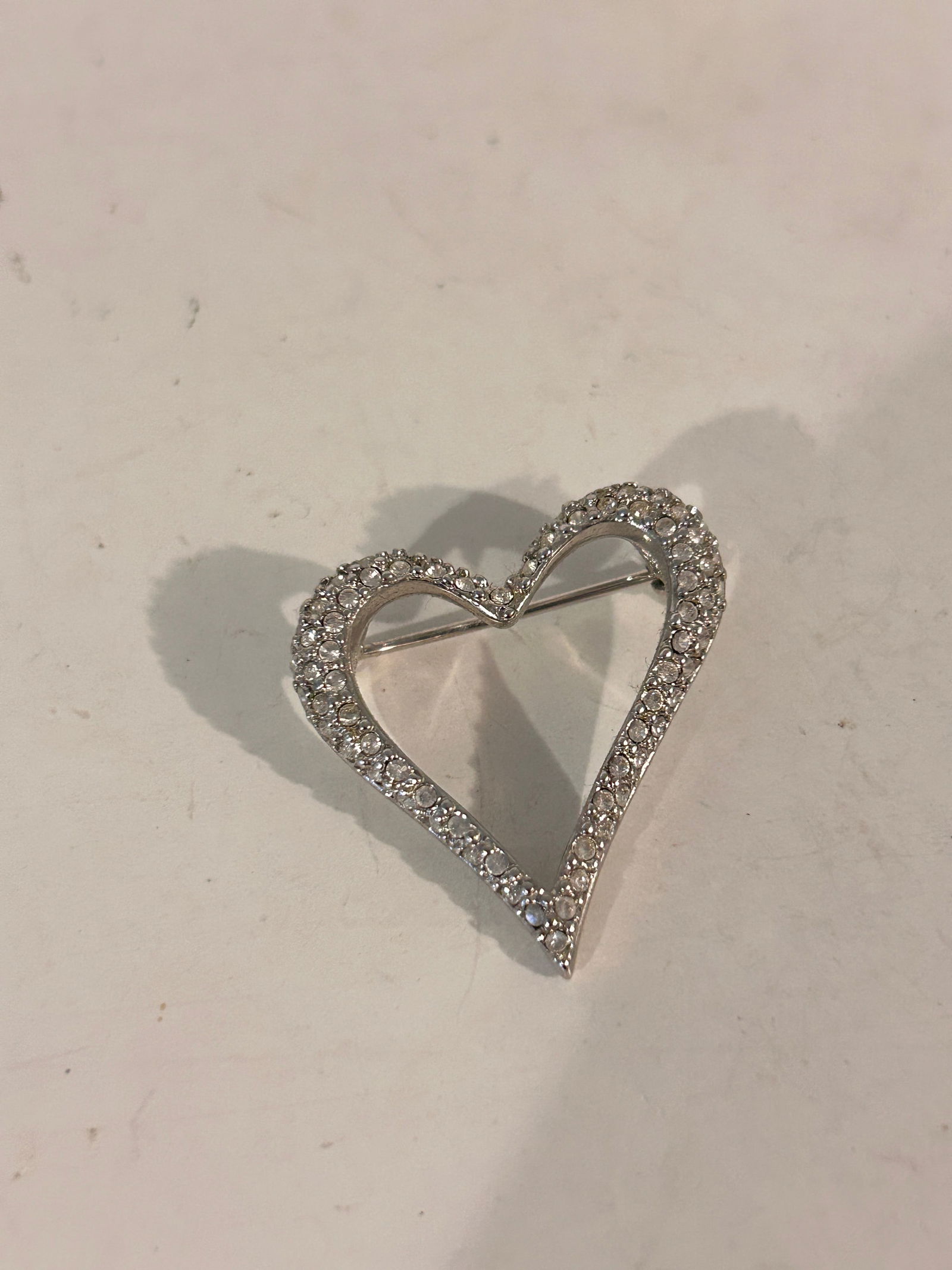 Vintage Swarovski Crystal heart Brooch: Vintage Swarovski Crystal heart Brooch Please view all photos as they are part of the description and condition of this Item, Feel free to contact me with questions or picture requests! Used Item AS I