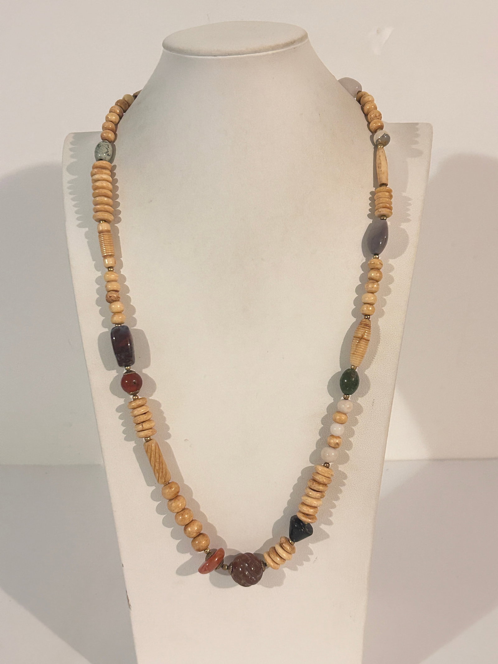 Vintage bone and stone Tribal long necklace 28": Vintage bone and stone Tribal long necklace 28" Please view all photos as they are part of the description and condition of this Item, Feel free to contact me with questions or picture requests! Used