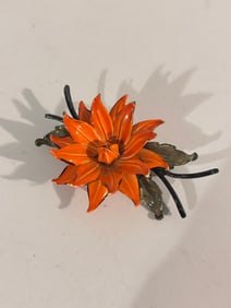 Vintage orange enamel metal flower brooch
