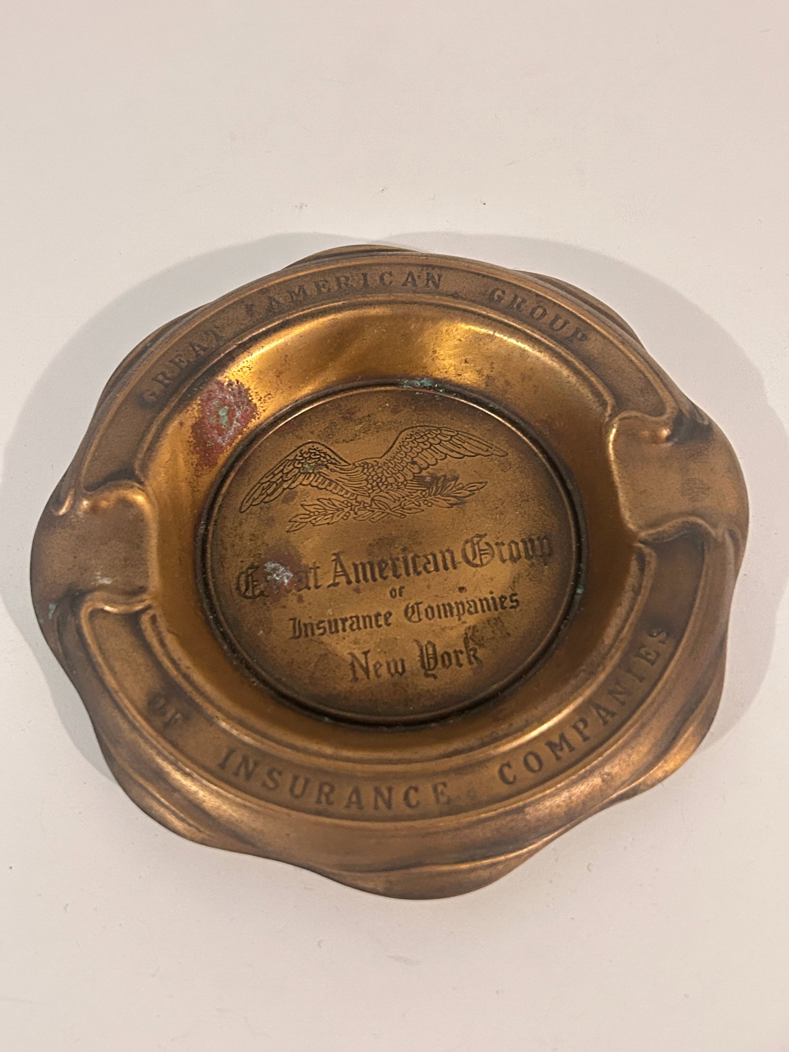 Vintage brass ashtray for the Great American Group of Insurance Companies: Vintage brass ashtray for the Great American Group of Insurance Companies Please view all photos as they are part of the description and condition of this Item, Feel free to contact me with questions 