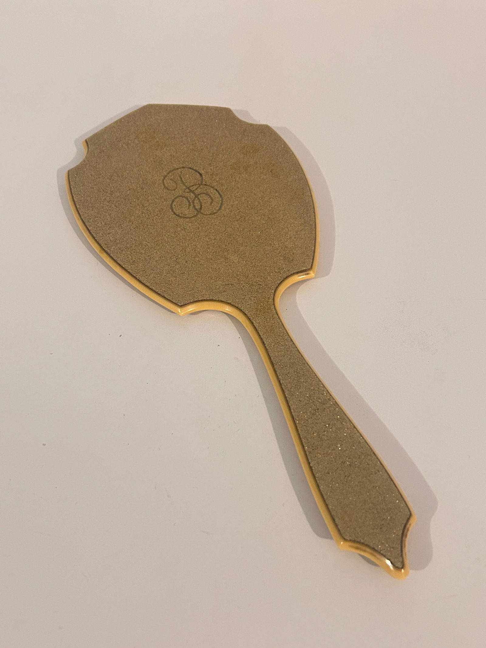 vintage 1930s celluloid SilvaLeur Goldaleur hand mirror with a gold glitter finish and an embossed (1 of 4)
