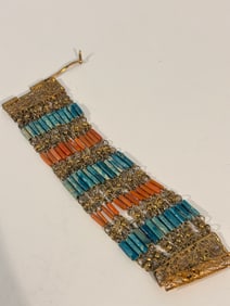 vintage Egyptian Revival bracelet, from the 1930s, featuring faience beads and brass hinge