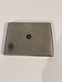 vintage silver hammered cigarette or card case with a gold-washed interior and an enamel crest