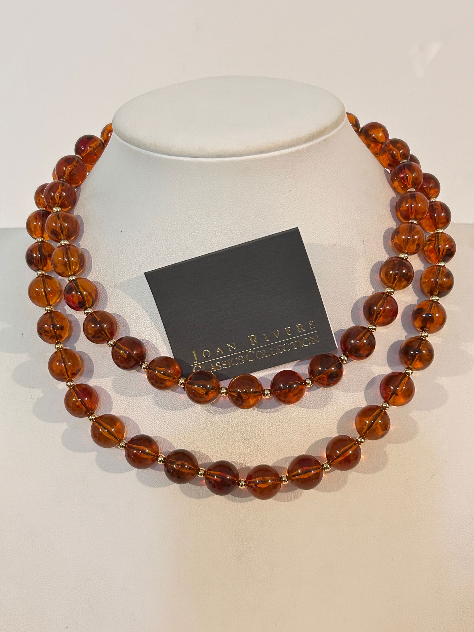 Vintage Joan Rivers Amber Colored beaded Necklace 30": Vintage Joan Rivers Amber Colored beaded Necklace 30" Please view all photos as they are part of the description and condition of this Item, Feel free to contact me with questions or picture requests!