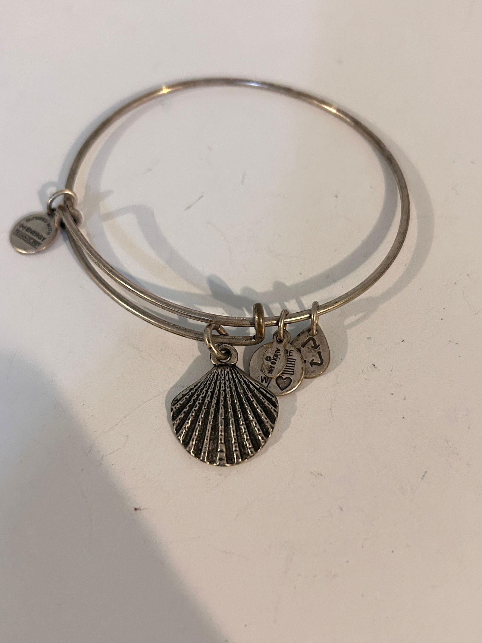 Vintage Alex and Ani Bracelet adjustable: Vintage Alex and Ani Bracelet adjustable Please view all photos as they are part of the description and condition of this Item, Feel free to contact me with questions or picture requests! Used Item AS